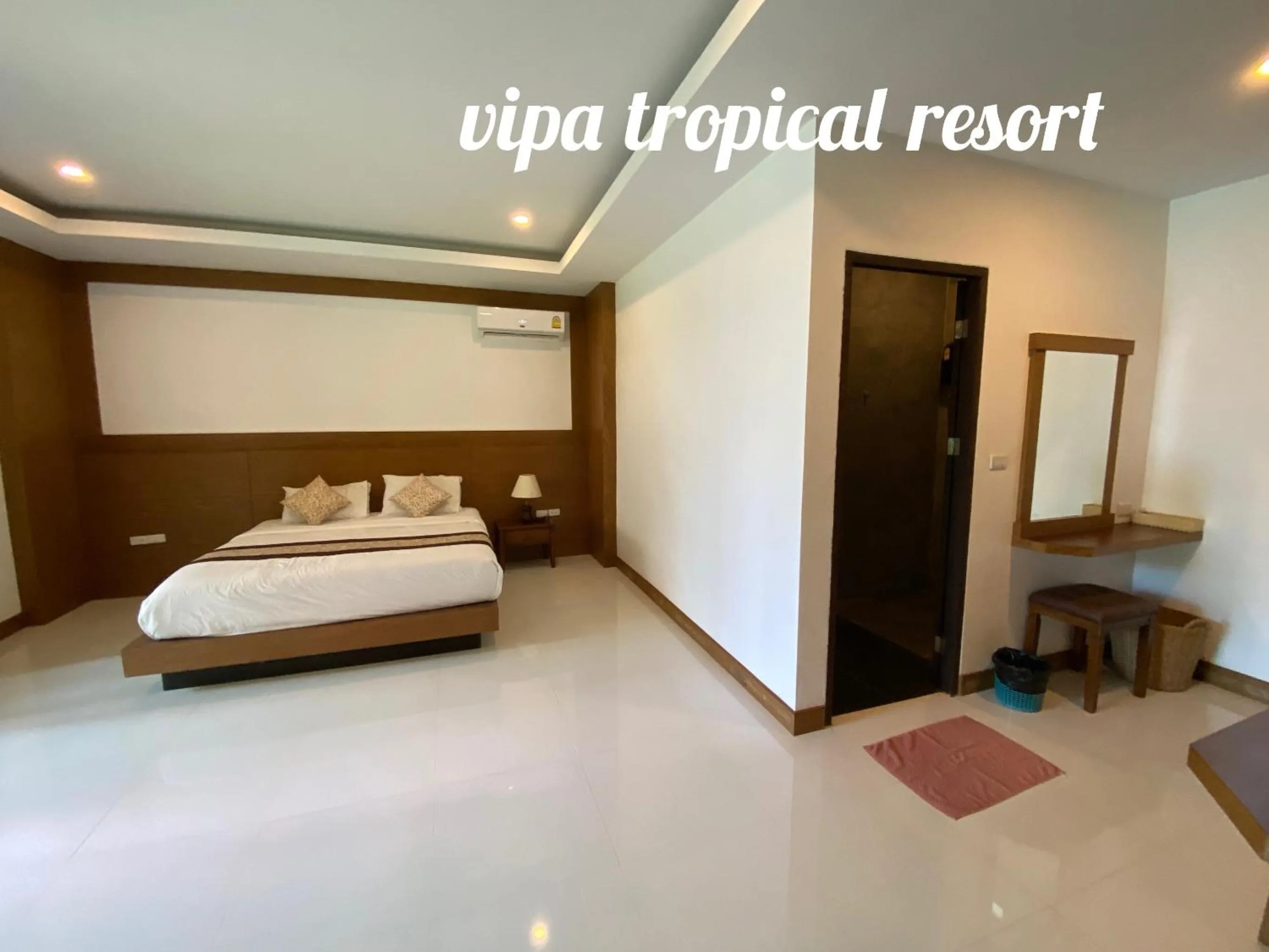Bed in Vipa Tropical Resort