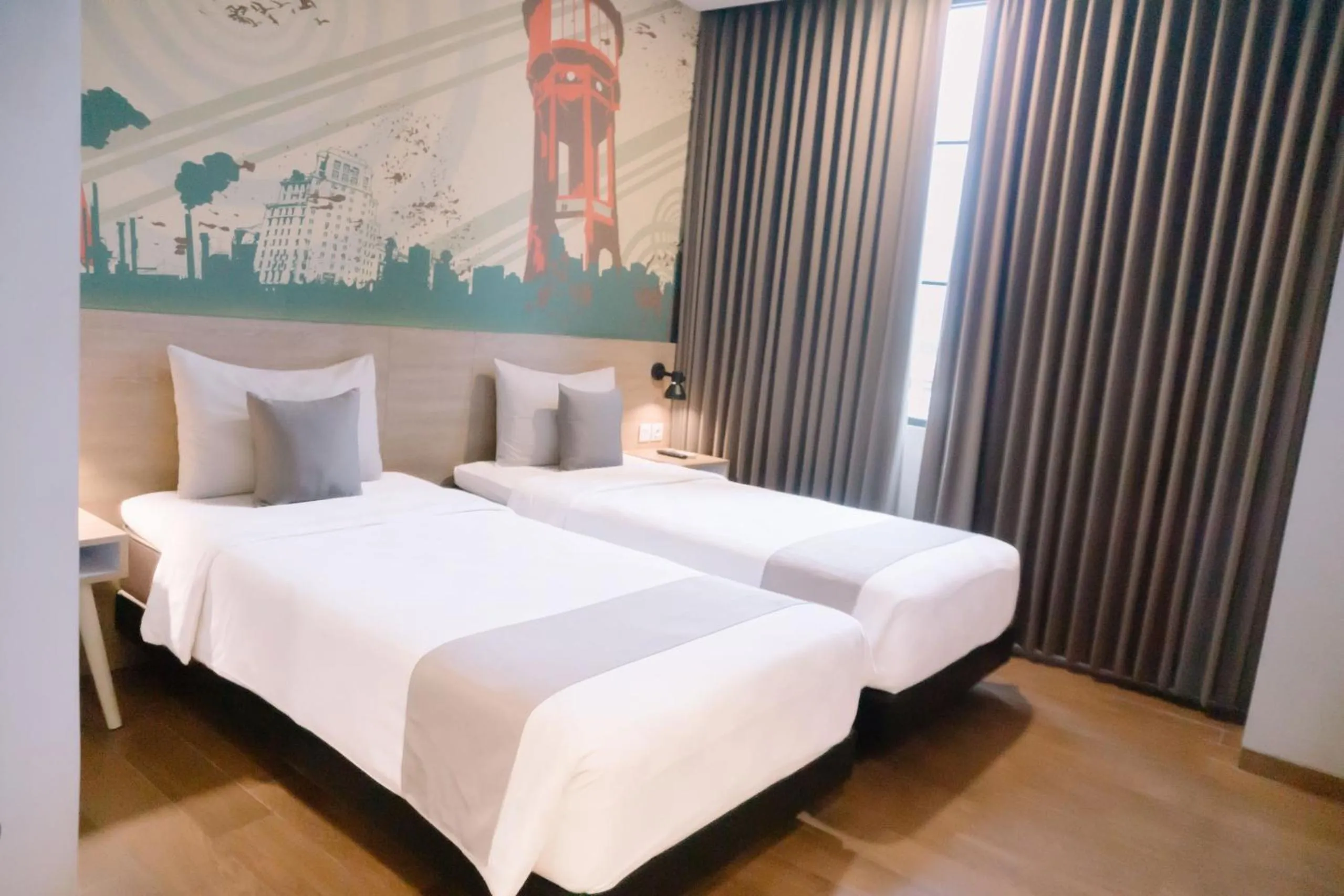Bed in Hotel Fortunagrande Jember By Fosia Hotels