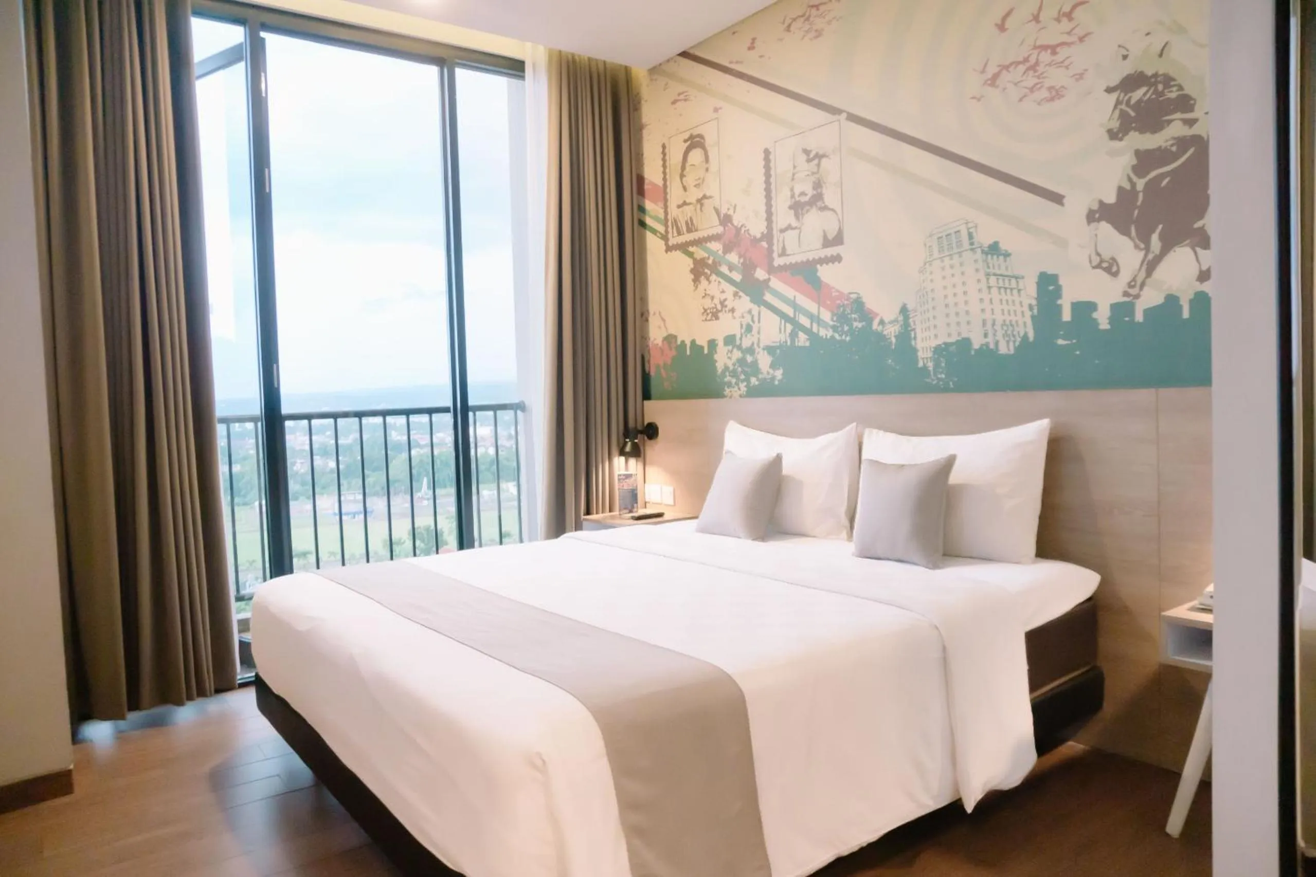 Bed in Hotel Fortunagrande Jember By Fosia Hotels