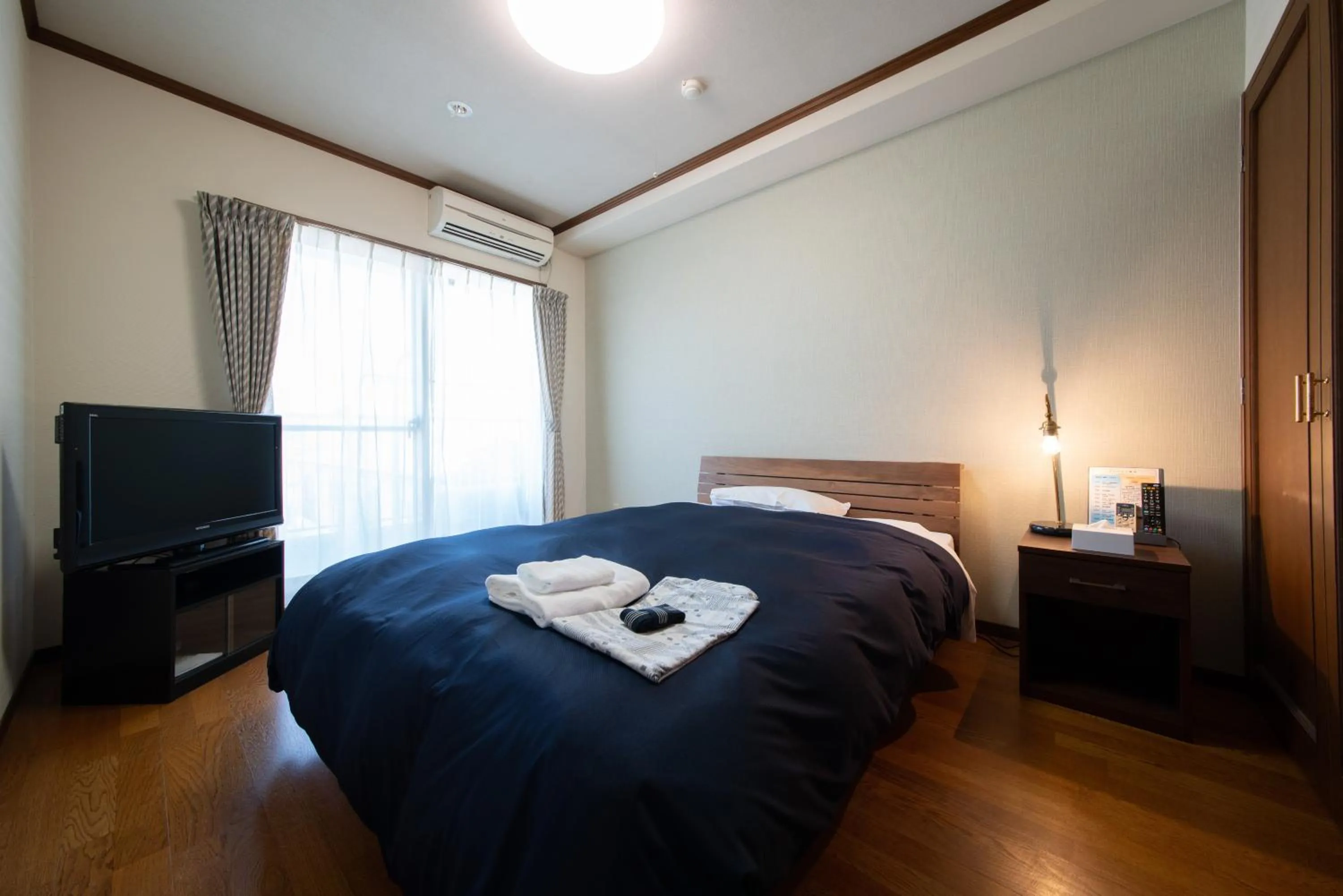 Bed in Asuka Hotel