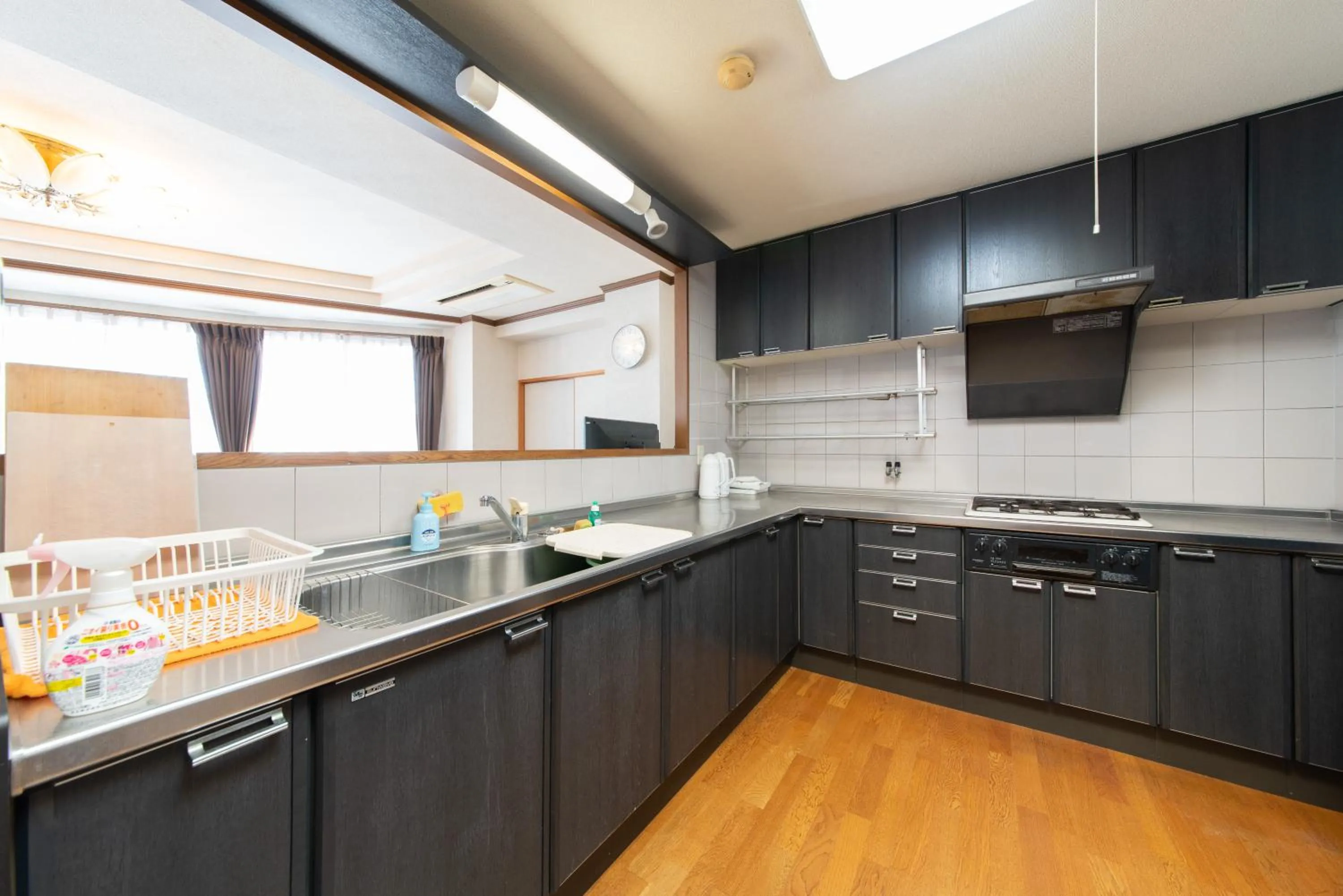 Kitchen or kitchenette in Asuka Hotel