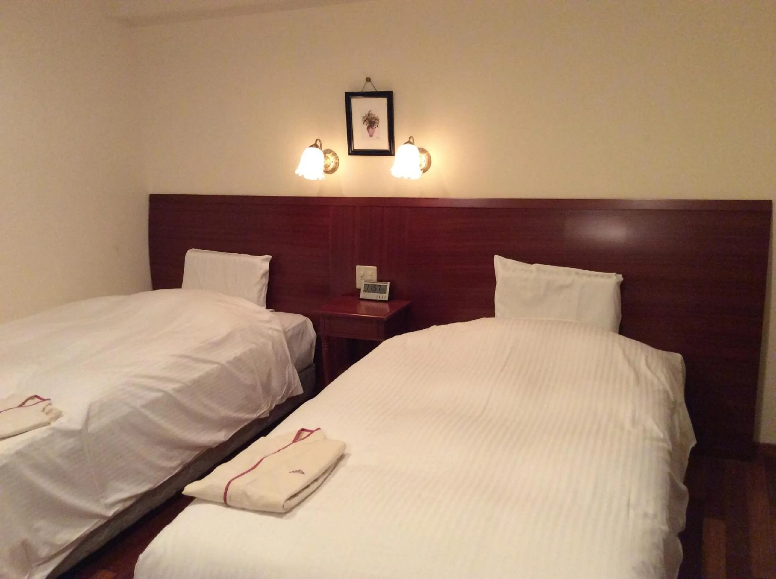 Bed in Hotel Sun Queen