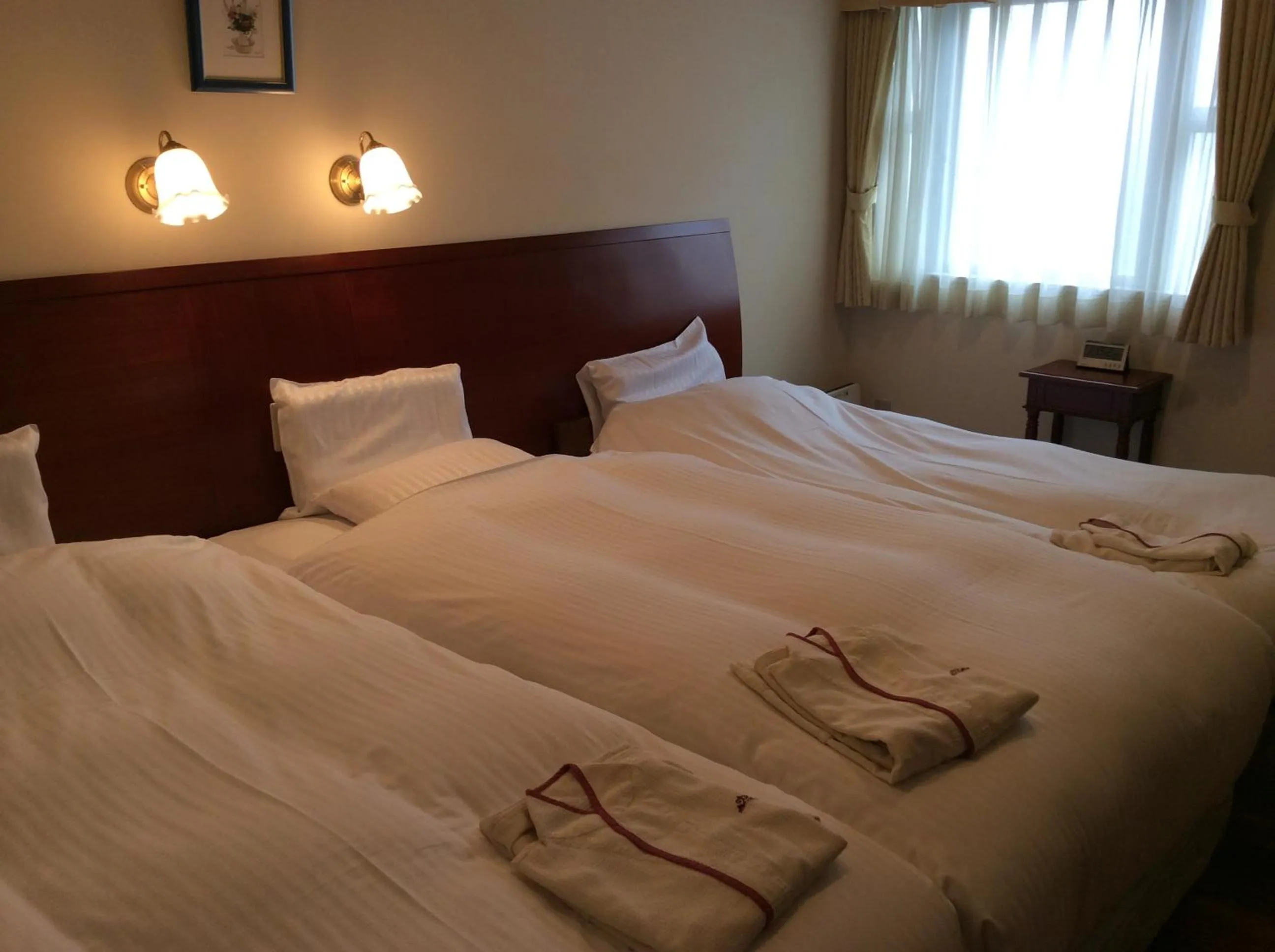 Bed in Hotel Sun Queen