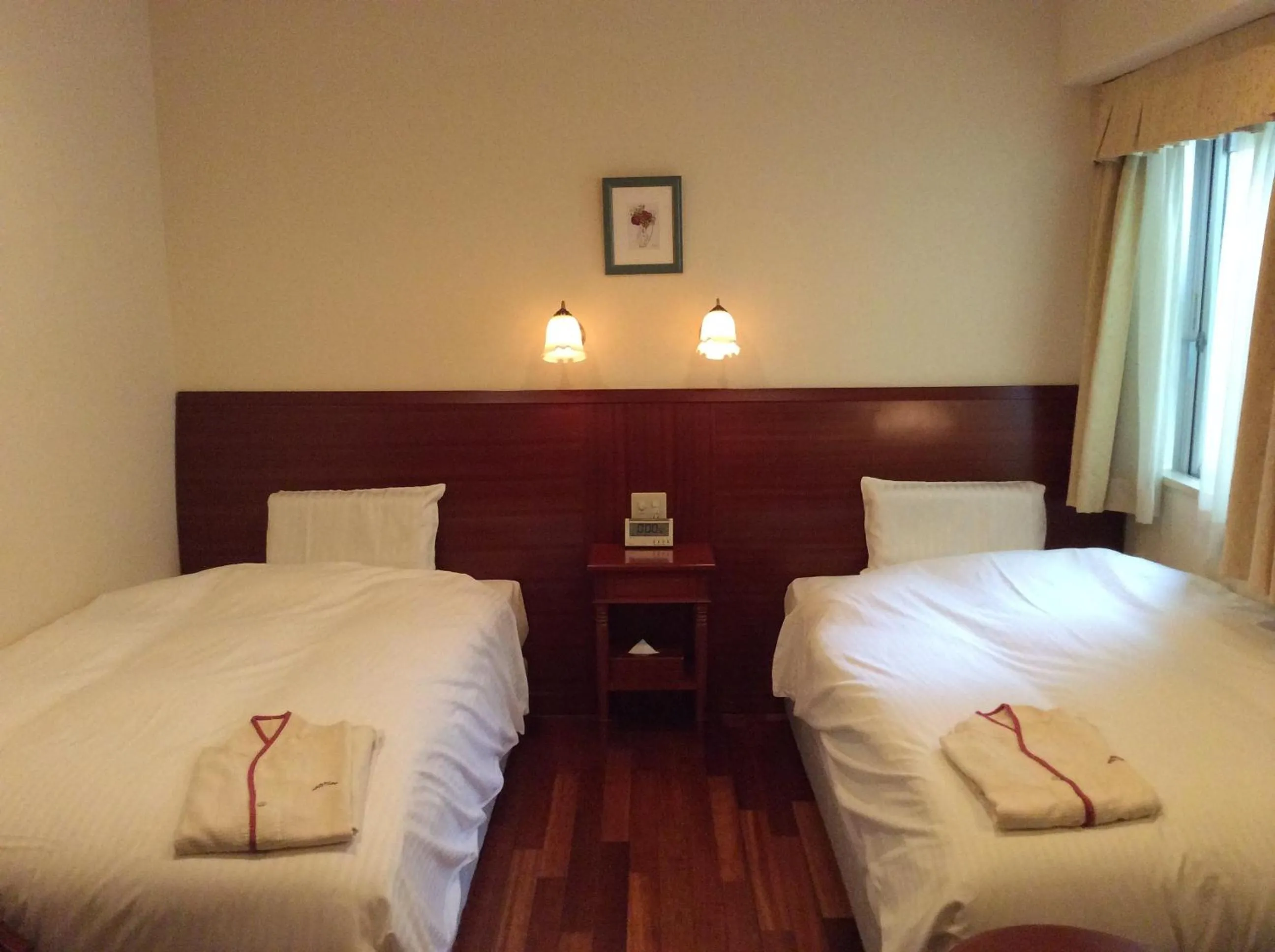 Bed in Hotel Sun Queen