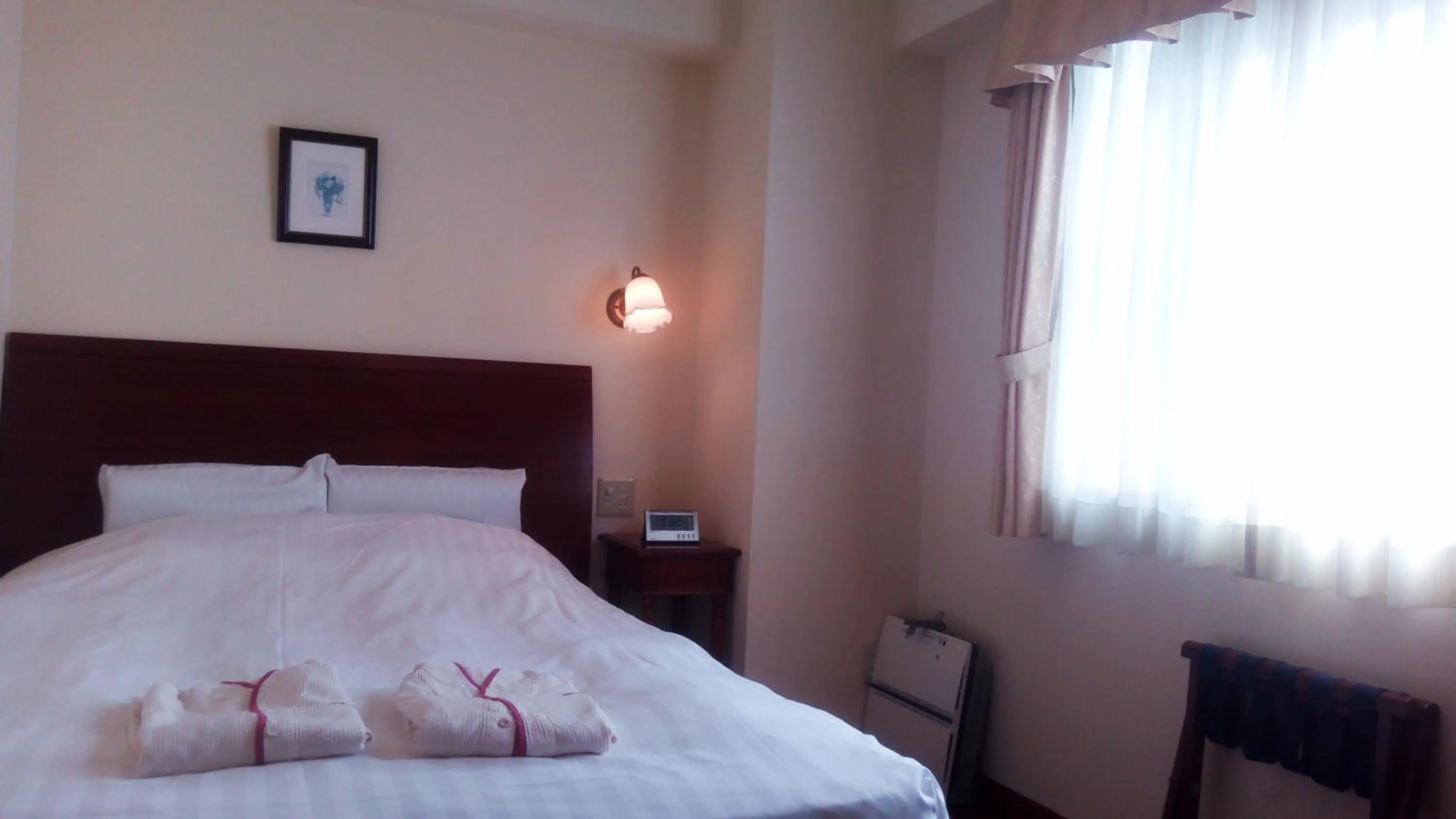 Bed in Hotel Sun Queen