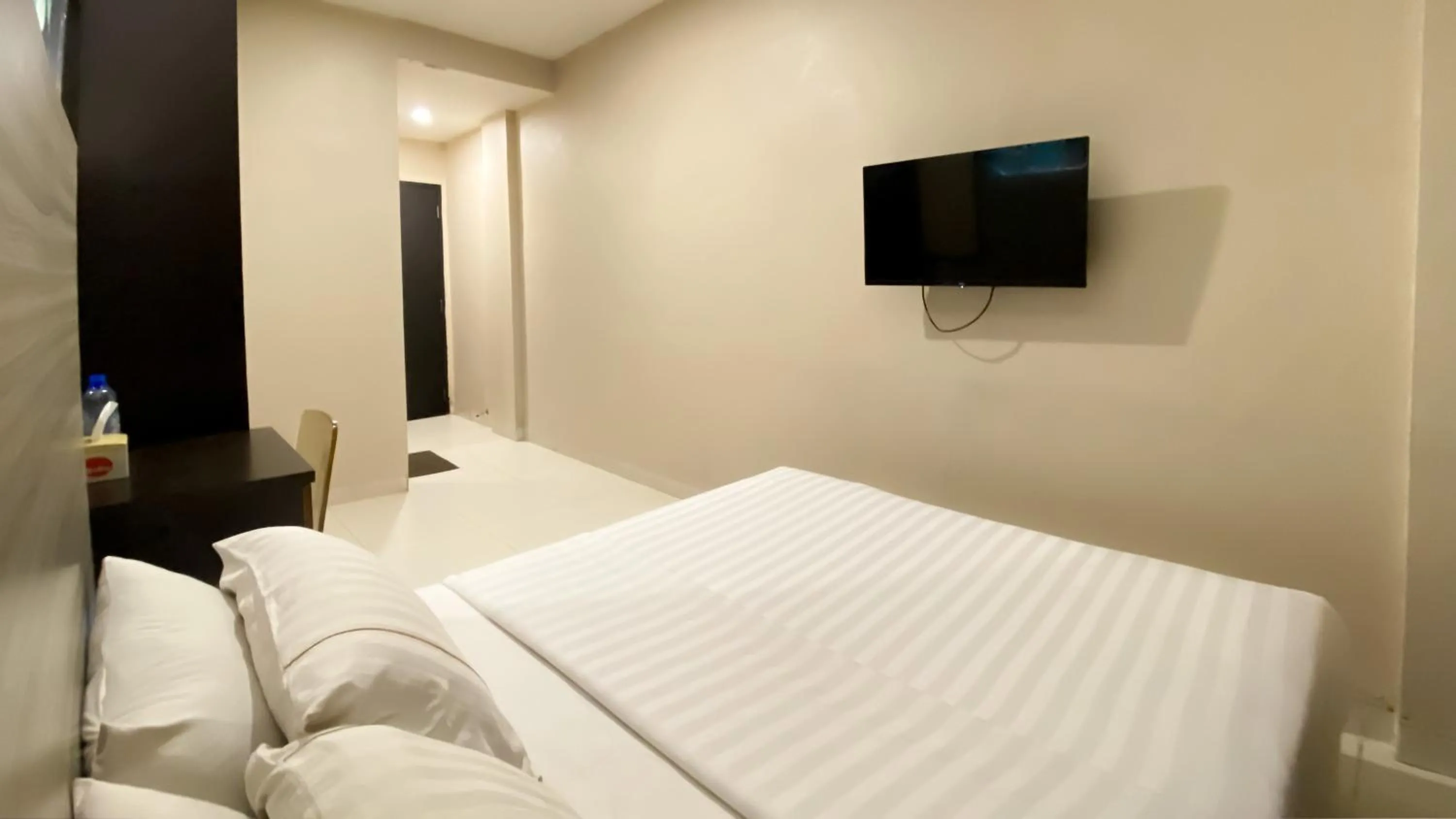 Bed in OS Hotel Batu Aji Batam