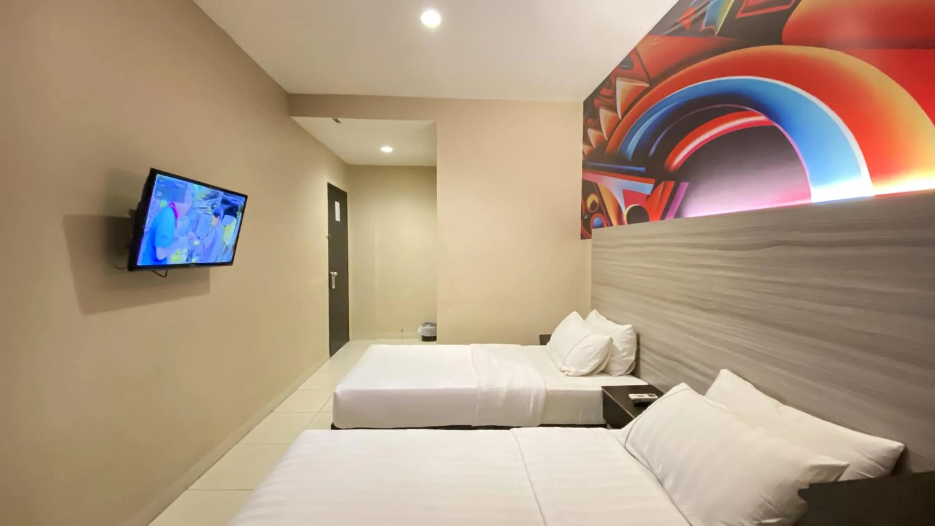 Bed in OS Hotel Batu Aji Batam