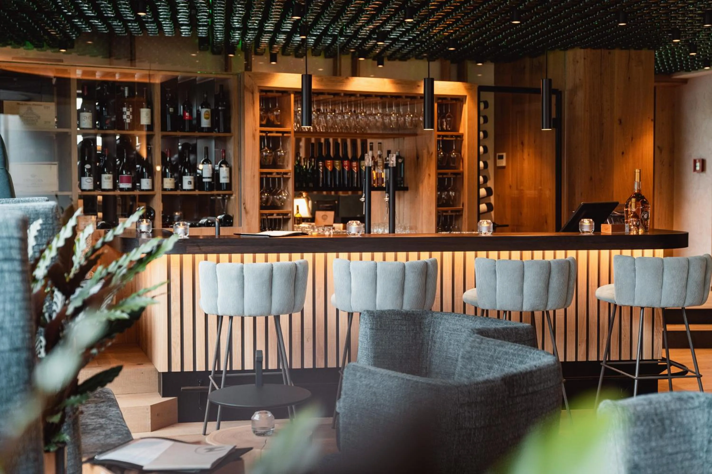 Lounge or bar in MONS suites wine passion