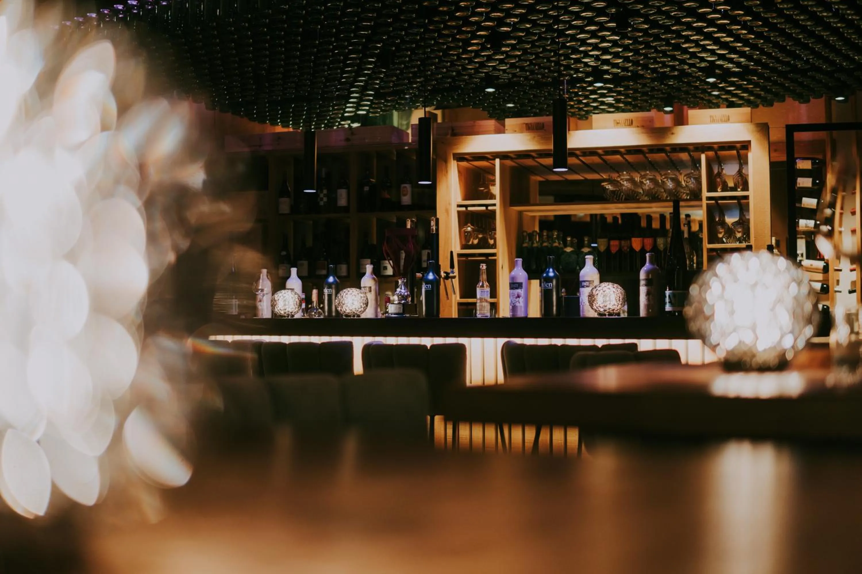 Lounge or bar in MONS suites wine passion