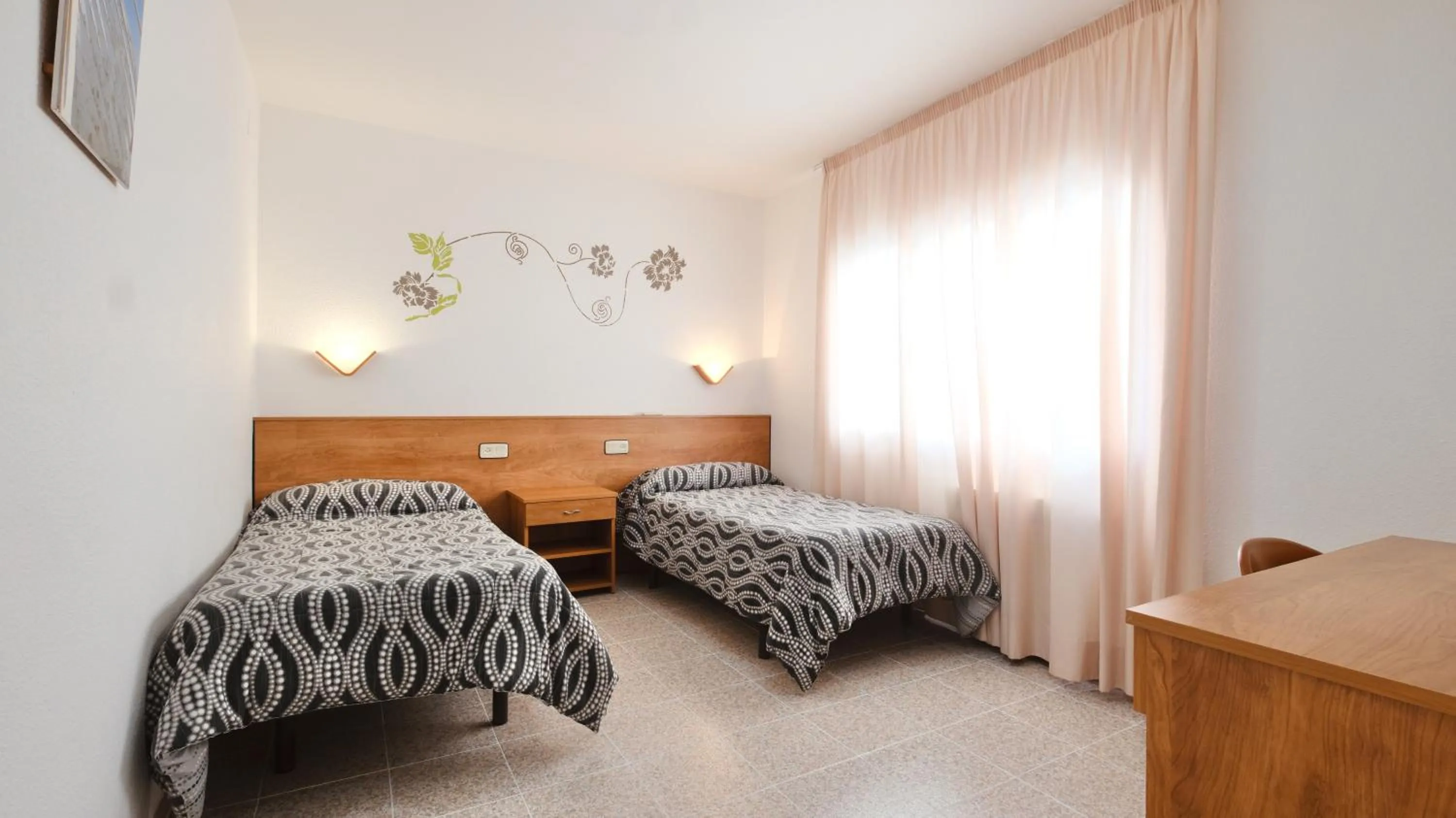 Bed in Hotel Paradís