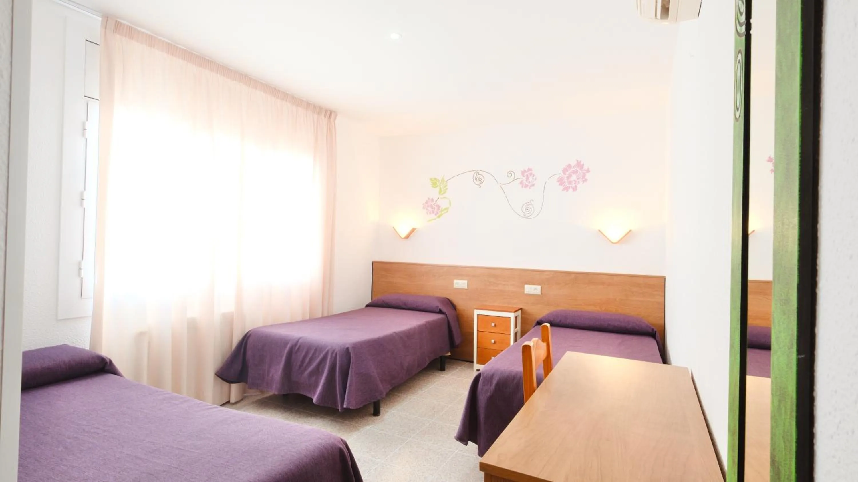 Bed in Hotel Paradís