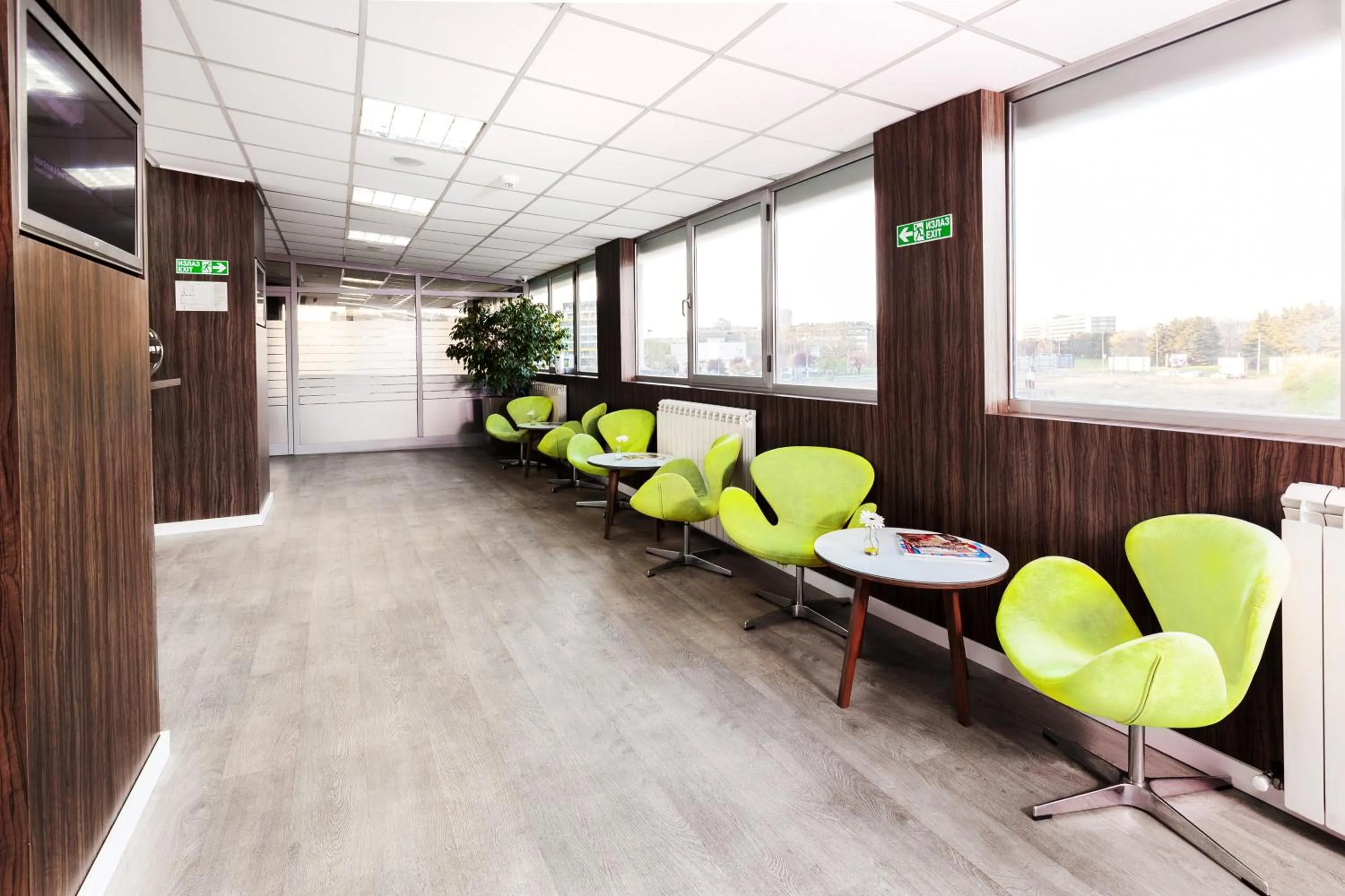 Communal lounge/ TV room in Adresa Suites