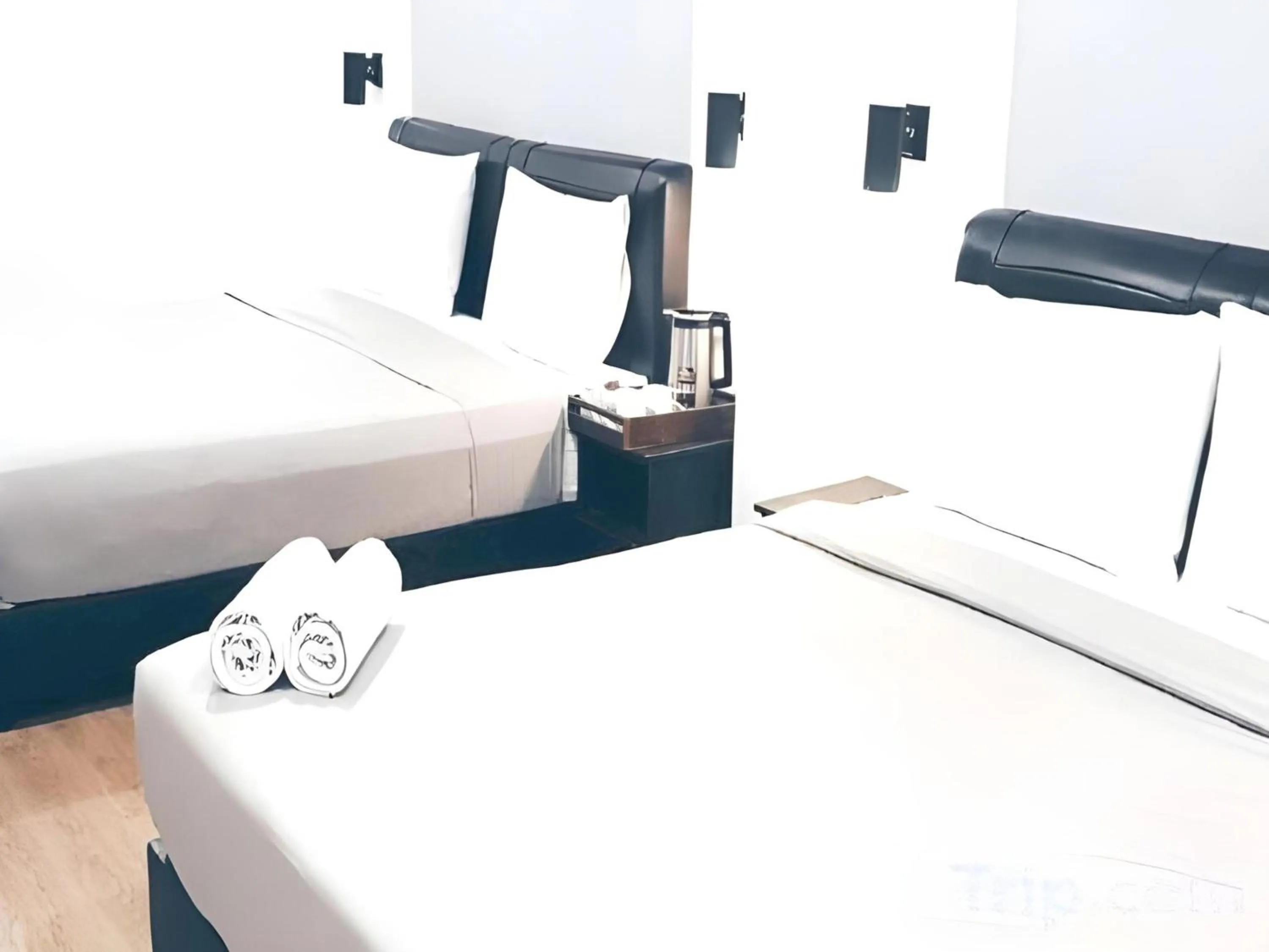 Bedroom in OYO 89492 Carlton Inn Bukit Ubi