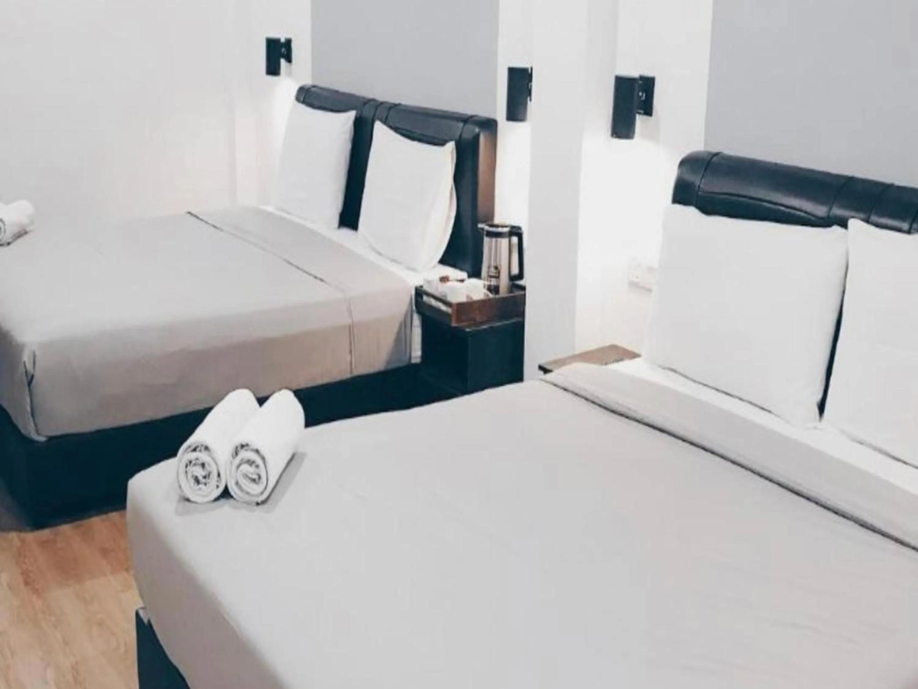 Bedroom in OYO 89492 Carlton Inn Bukit Ubi