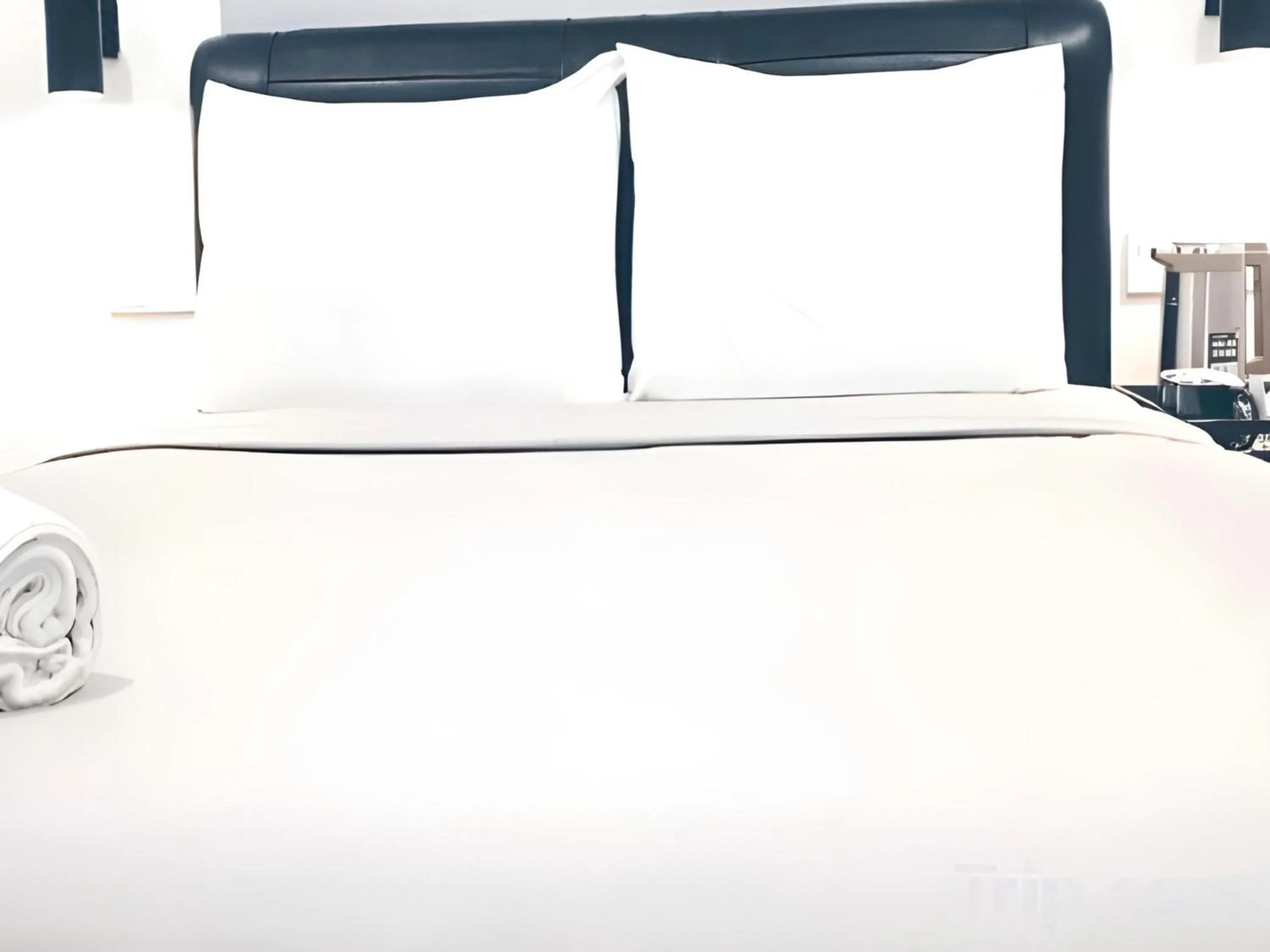 Bedroom in OYO 89492 Carlton Inn Bukit Ubi