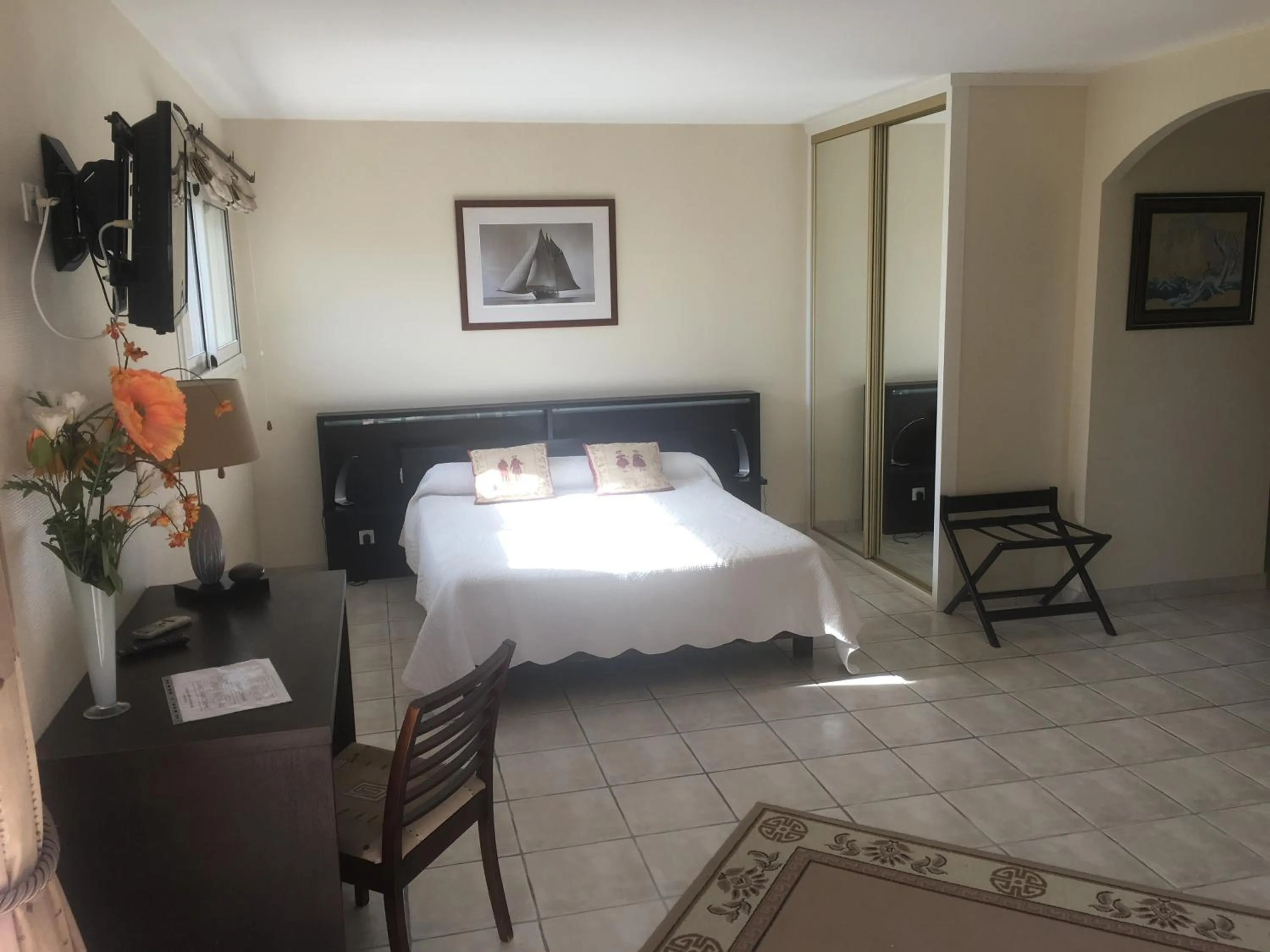 Bed in Chambres d'Hôtes La Coloniale