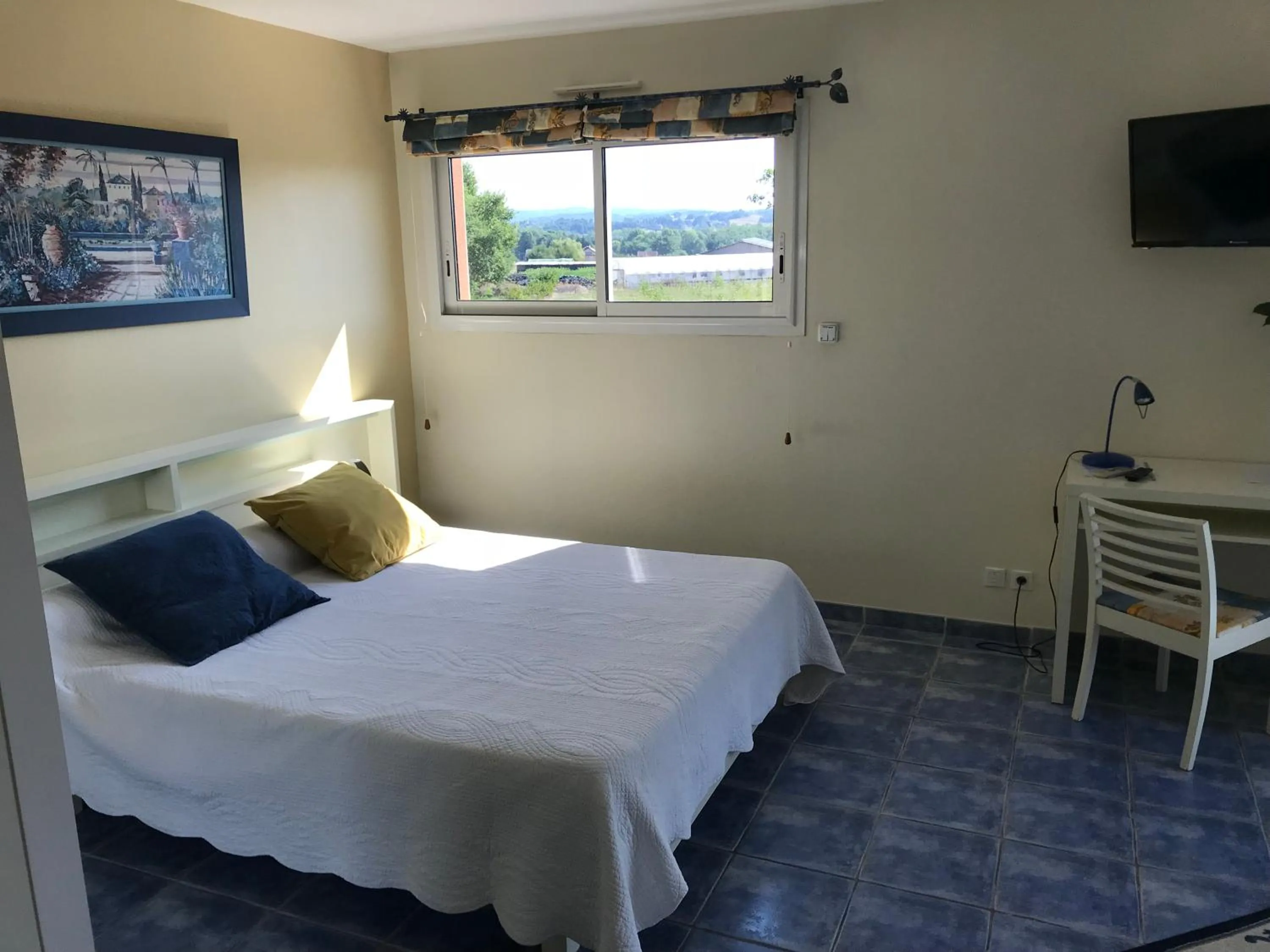 Bed in Chambres d'Hôtes La Coloniale