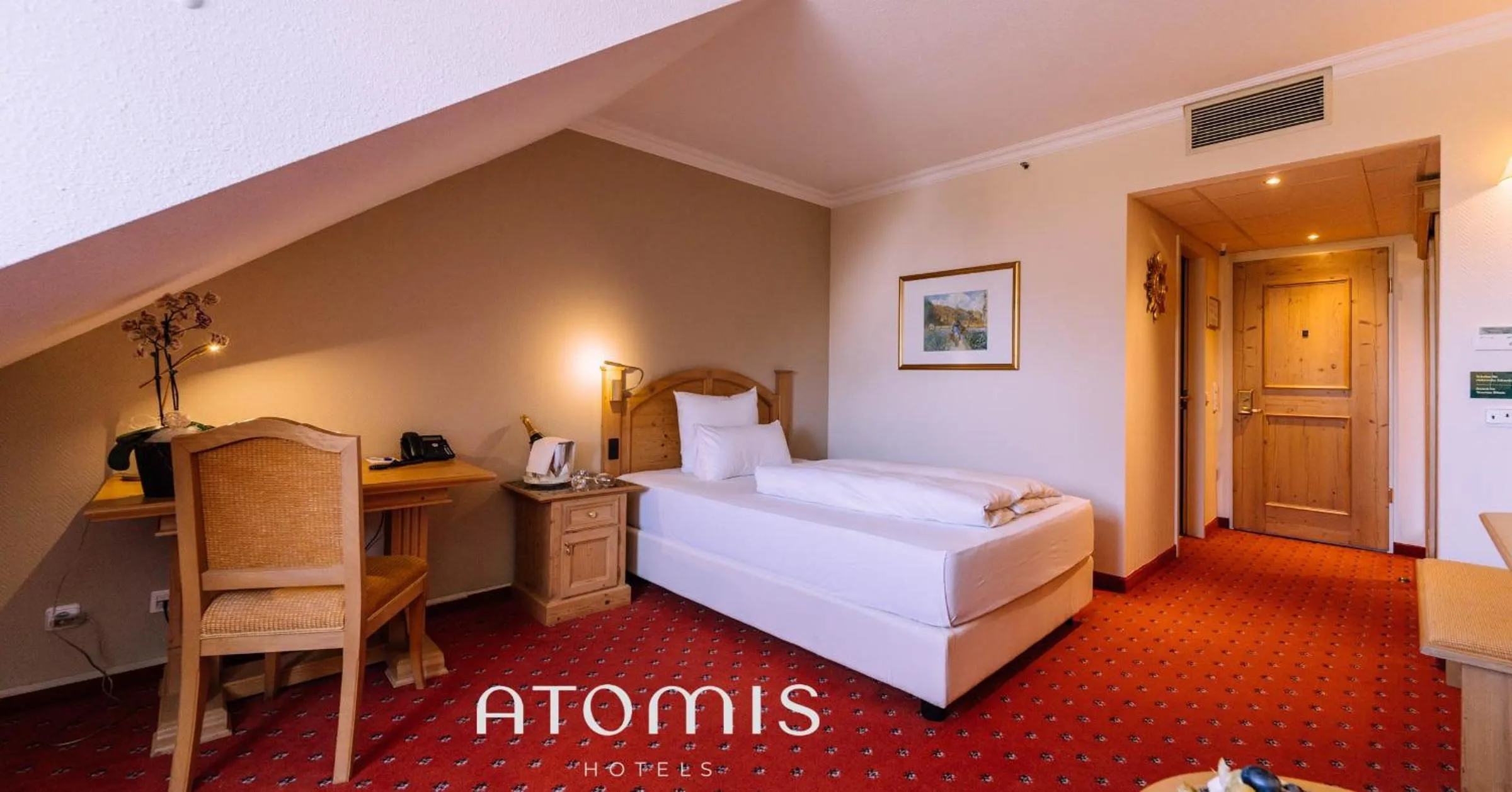 Photo of the whole room, Bed in Atomis Hotel Munich Airport by Mercure