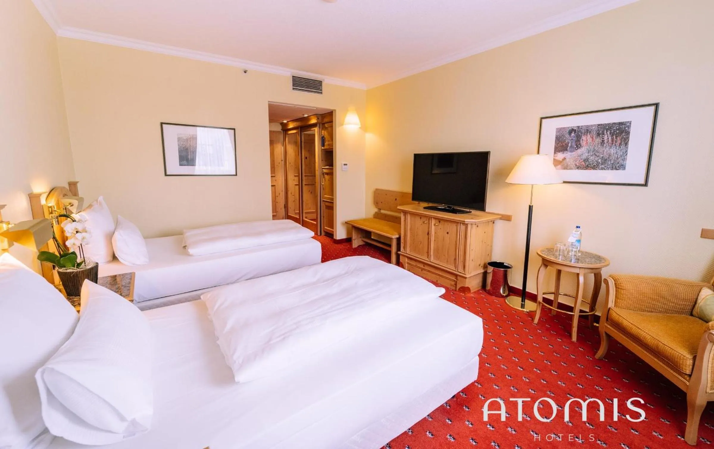 Photo of the whole room, Bed in Atomis Hotel Munich Airport by Mercure