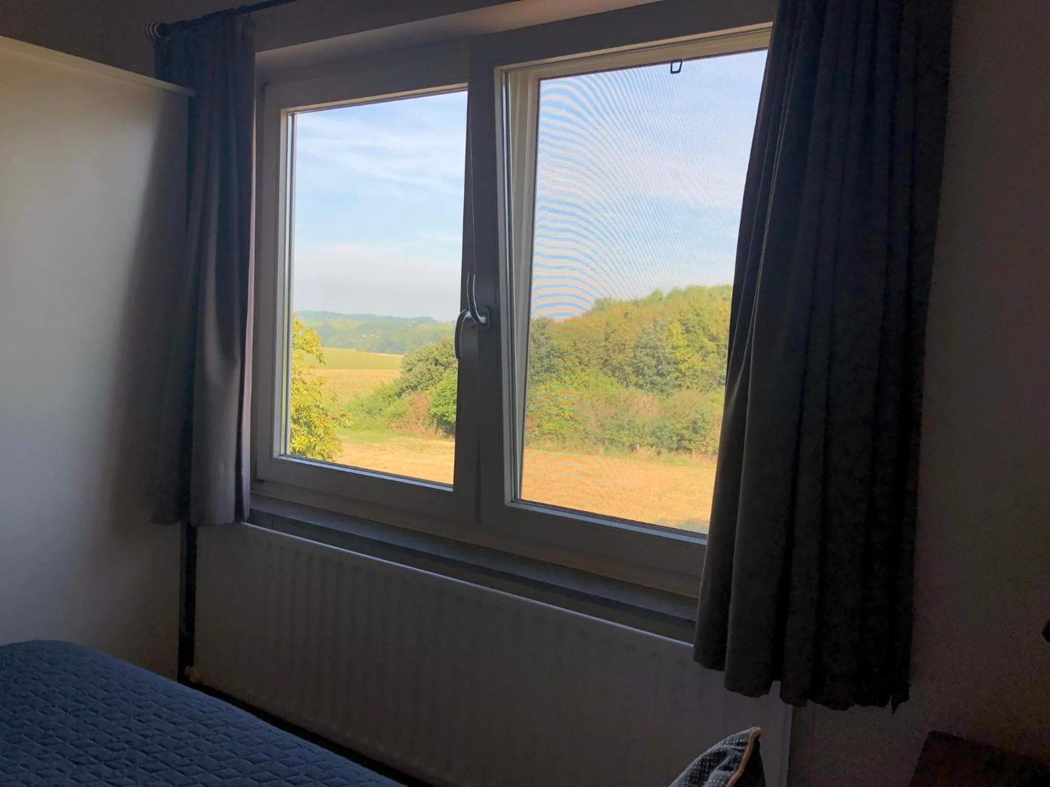 Garden view, Bed in Hotel de Plank - alle kamers met airconditioning