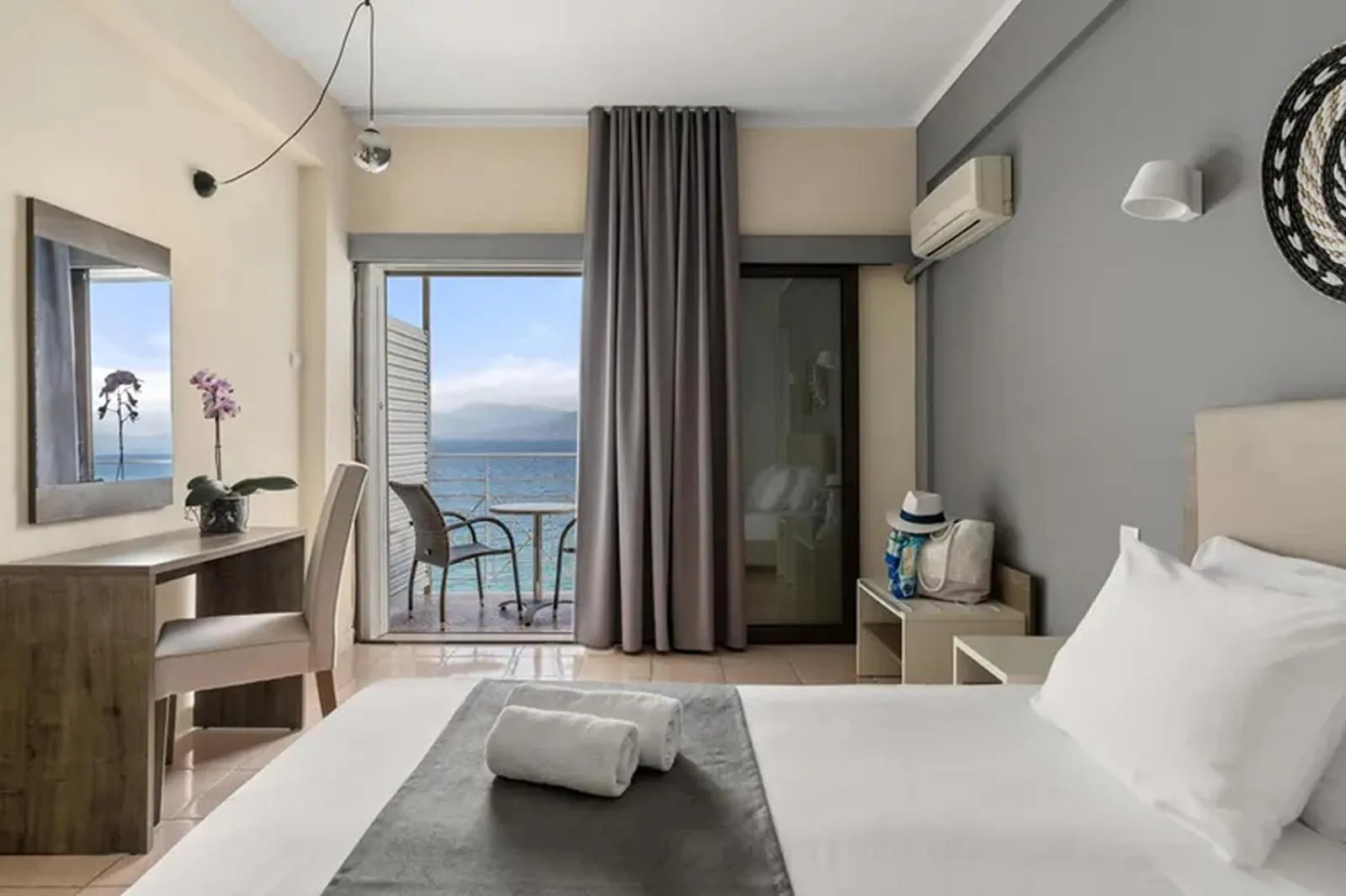 Photo of the whole room, Bed in Calamos Beach Family Club