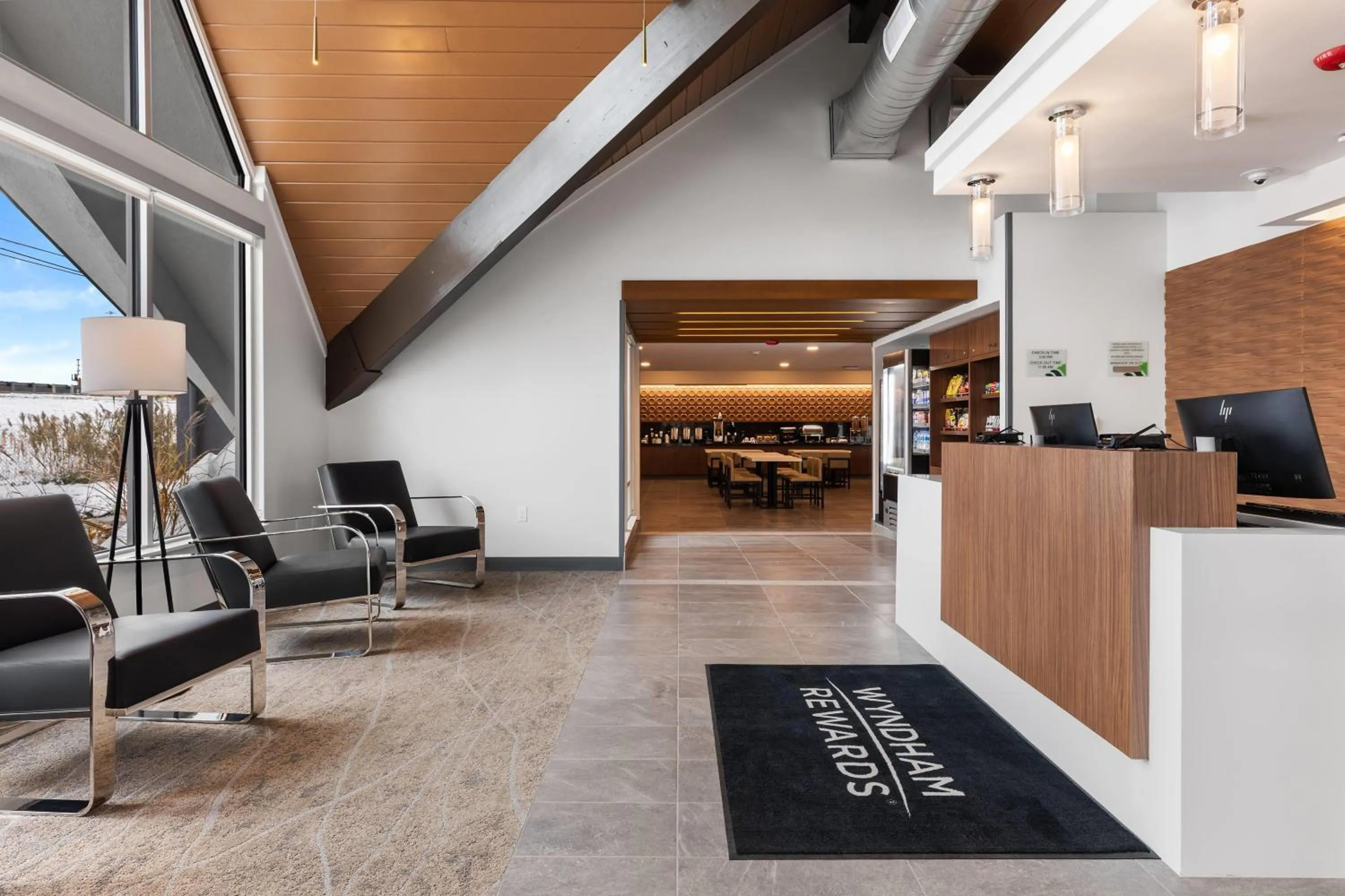 Lobby or reception in Wingate by Wyndham Geneva at SPIRE Academy