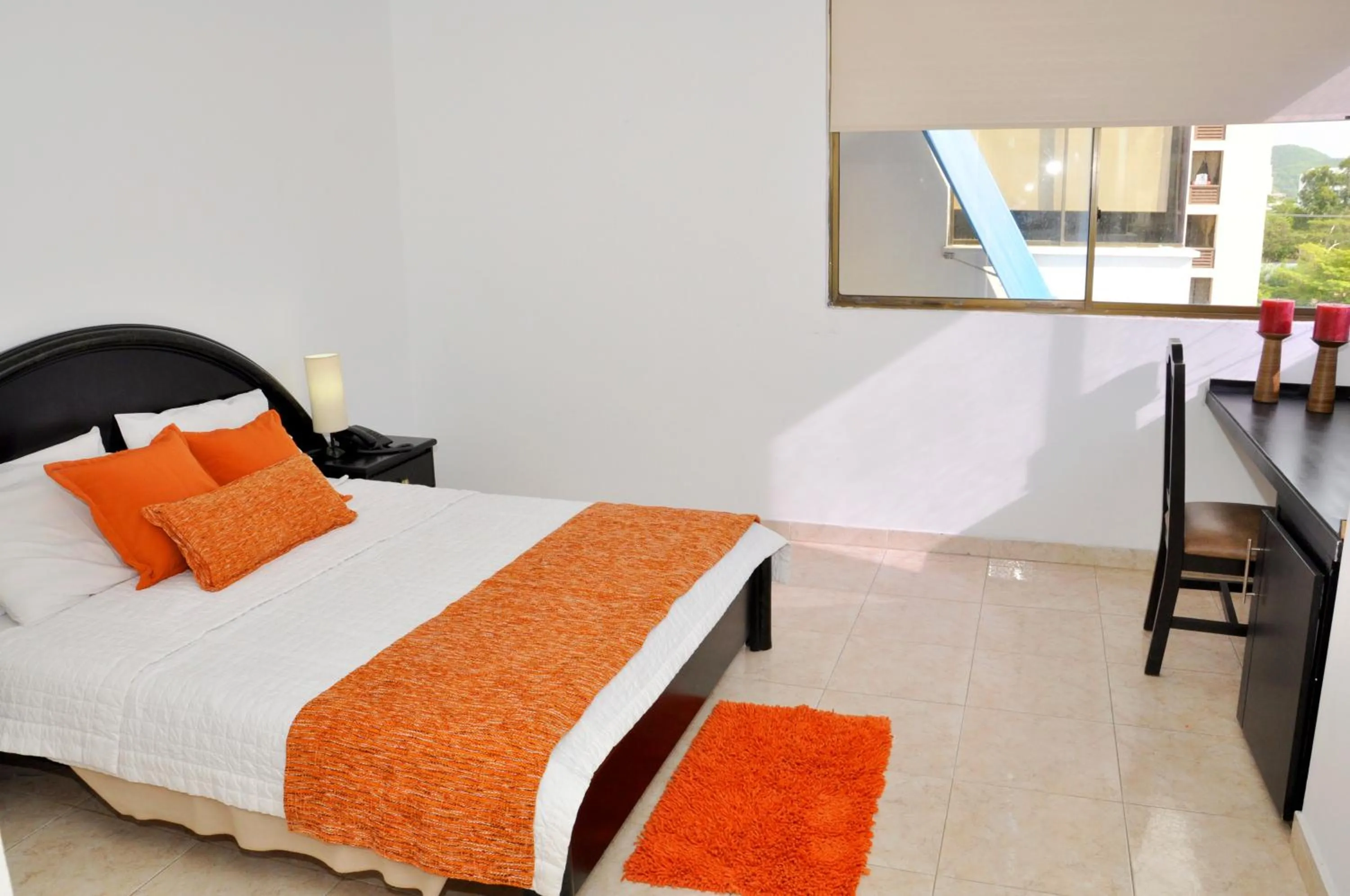 Bed in Hotel Axis Inn By GEH Suites