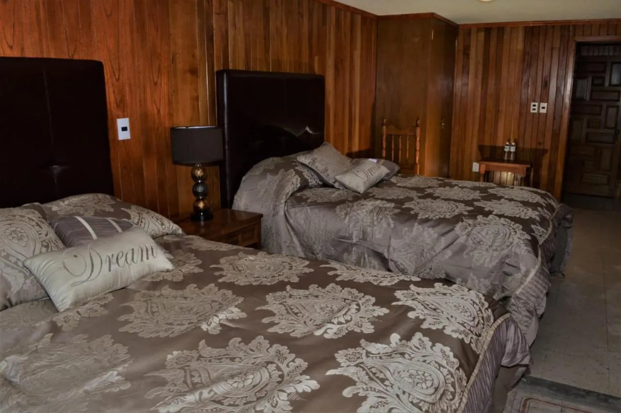 Bed in Hotel "La Cabaña de Don Adolfo"