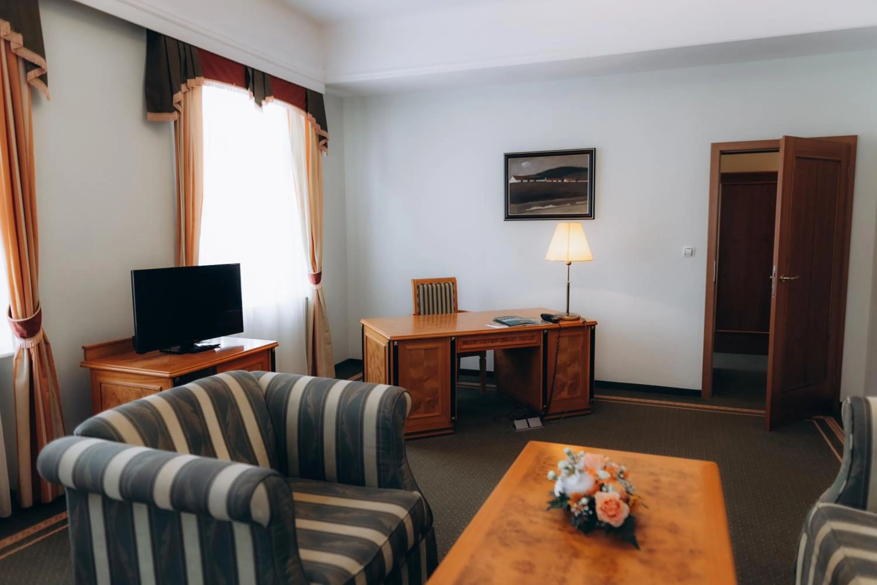 Communal lounge/ TV room in Parkhotel Golf Marianske Lazne