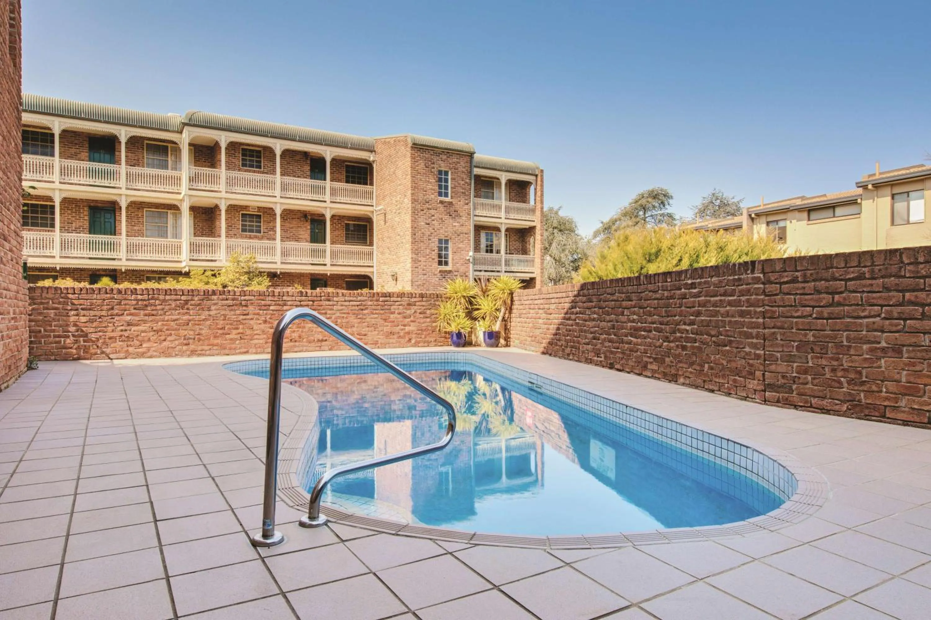 Pool view in Adina Serviced Apartments Canberra Kingston