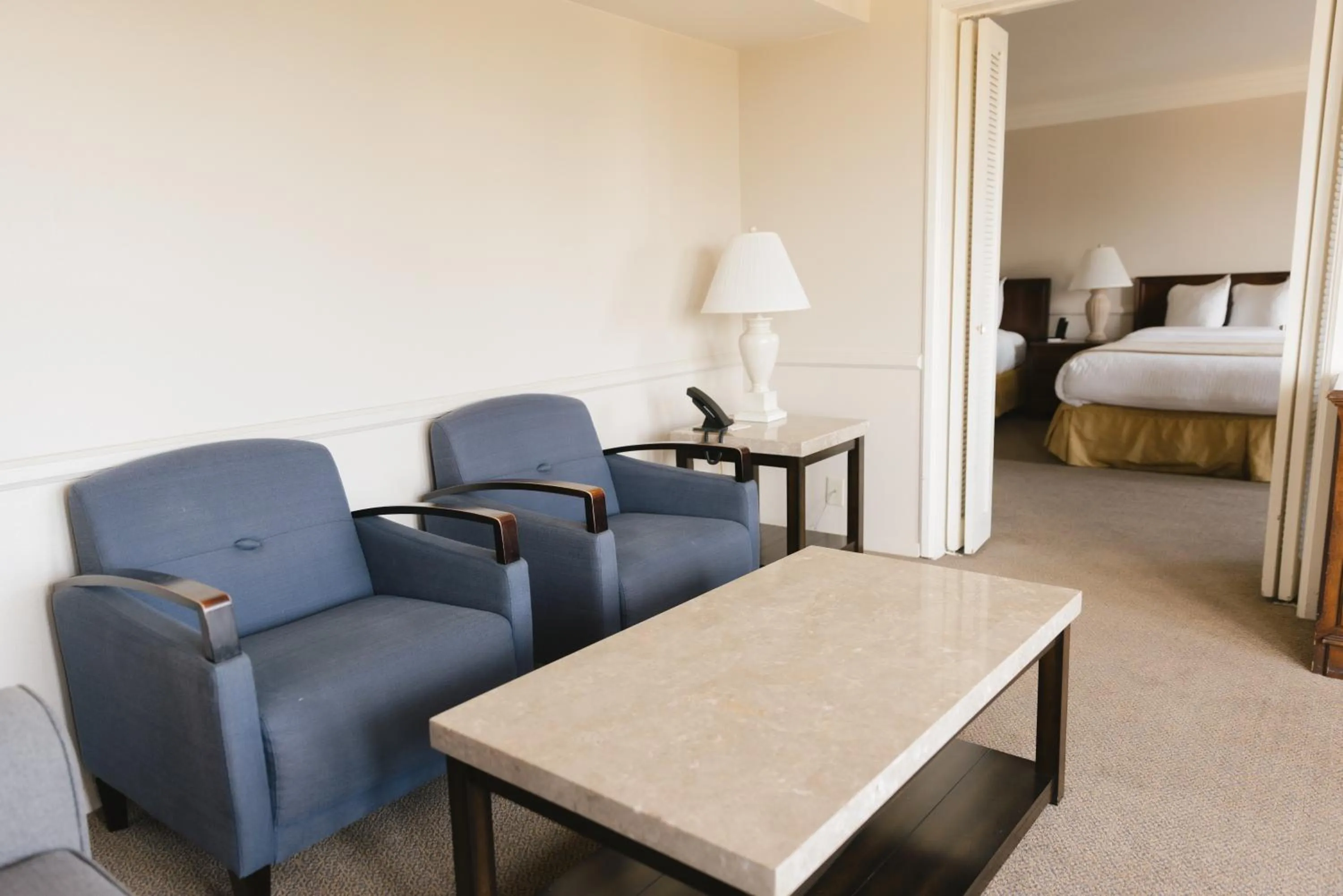 Seating area, Bed in Historic Santa Maria Inn