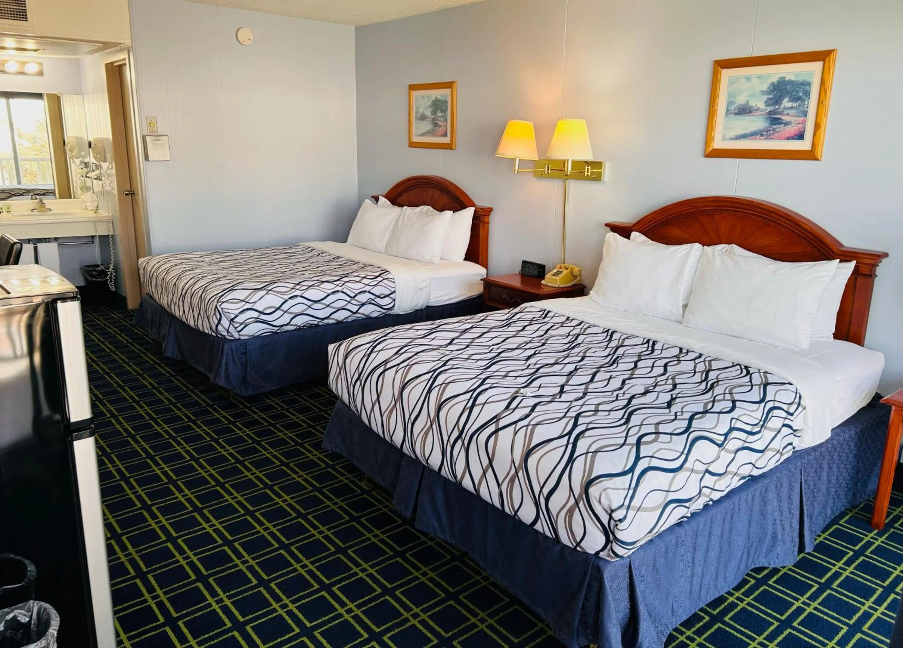 Photo of the whole room, Bed in Hospitality Inn