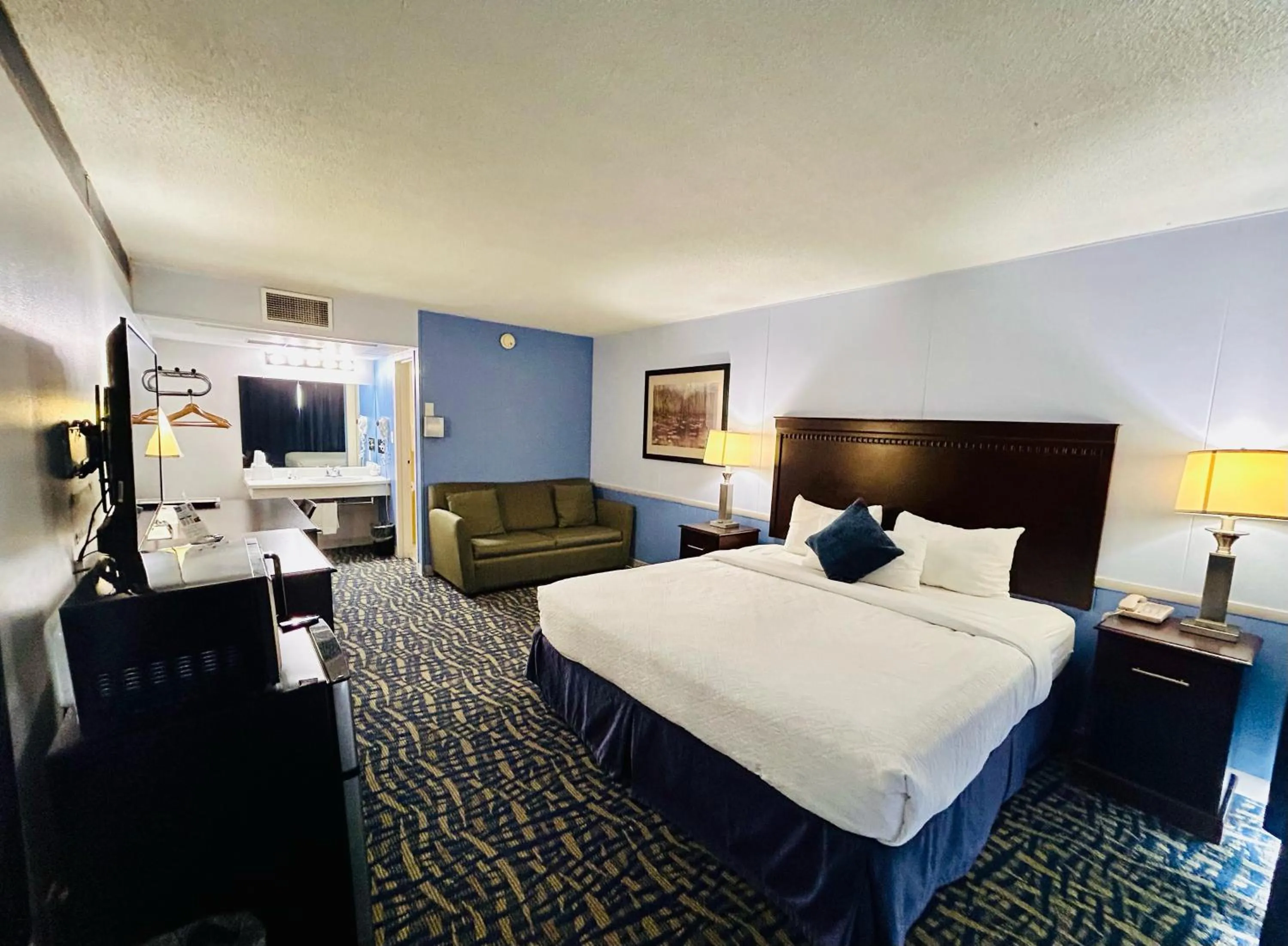 Bed in Hospitality Inn