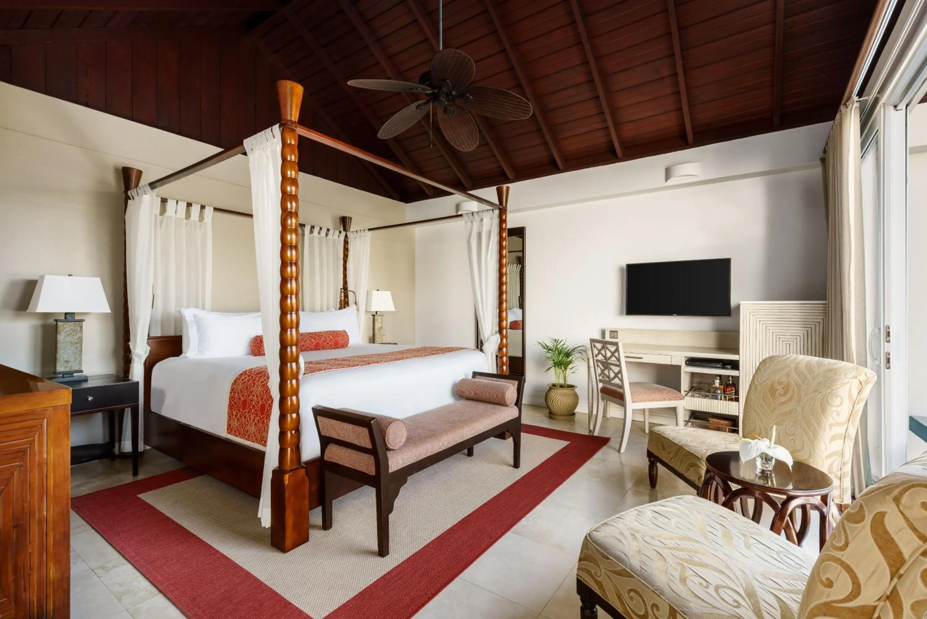 Seating area, Bed in Spice Island Beach Resort