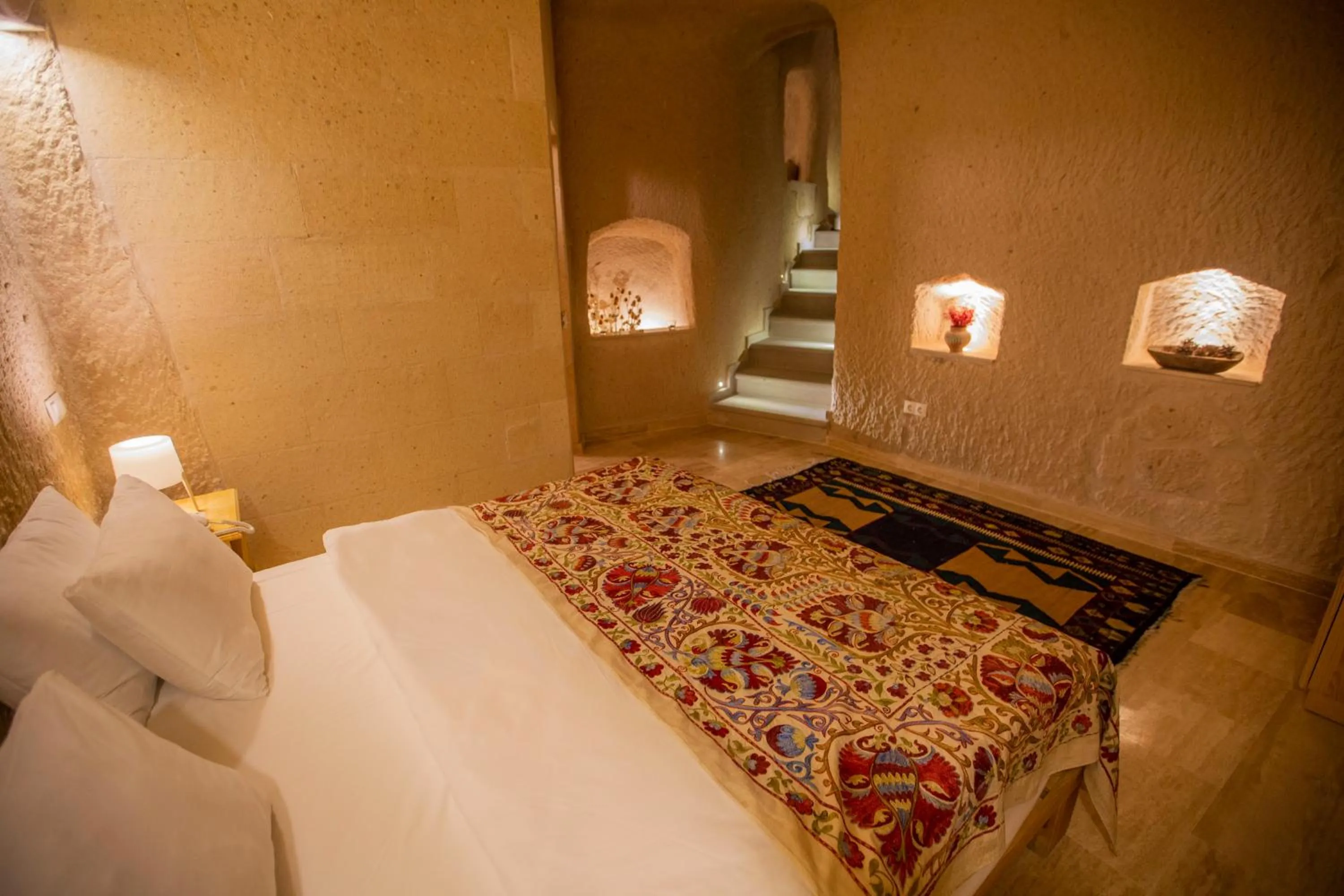 Bed in Maze Of Cappadocia Hotel