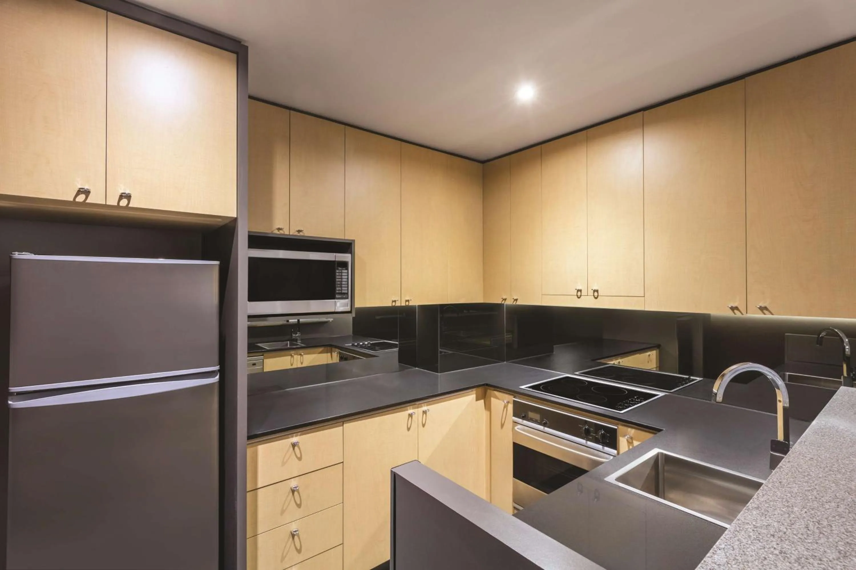 Kitchen or kitchenette in Adina Apartment Hotel Melbourne