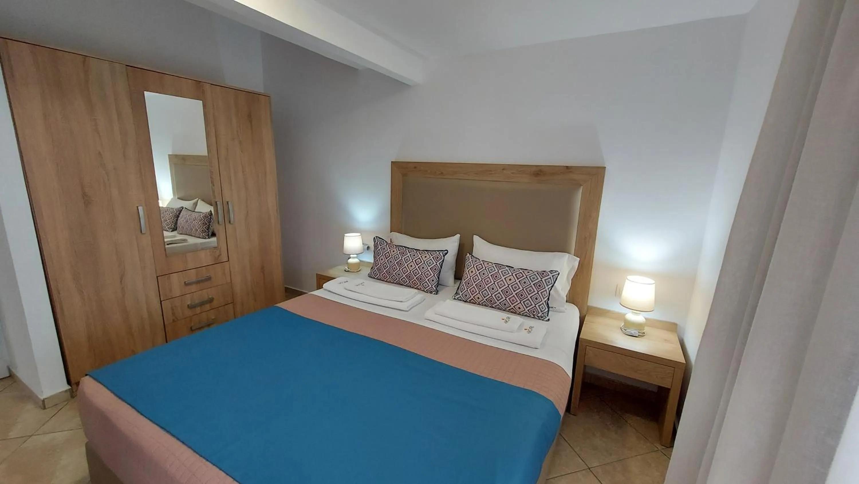 Bed in Argiri Apartments & Suites