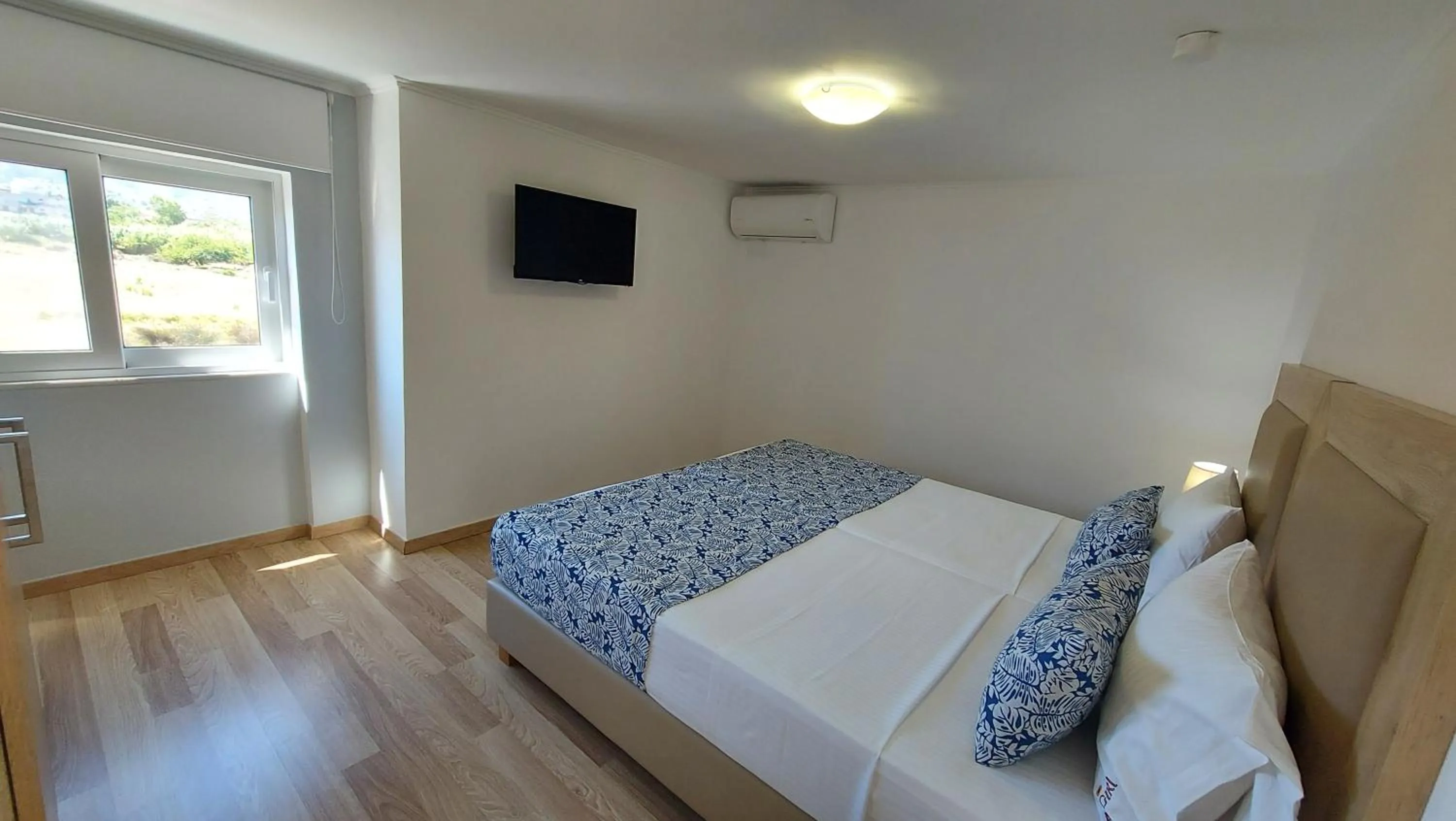 Bed in Argiri Apartments & Suites