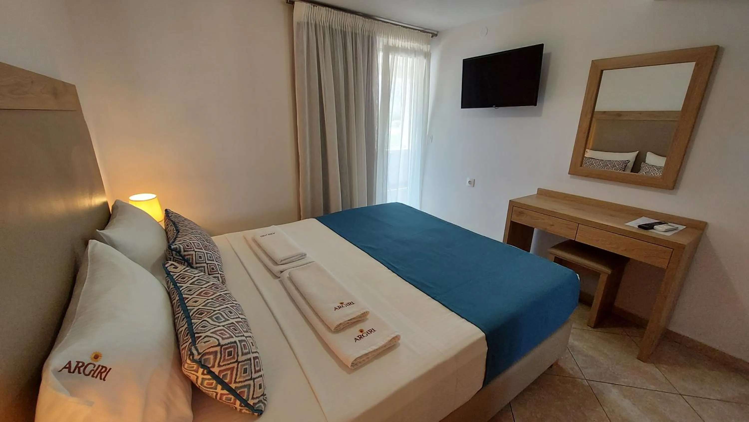 Bed in Argiri Apartments & Suites