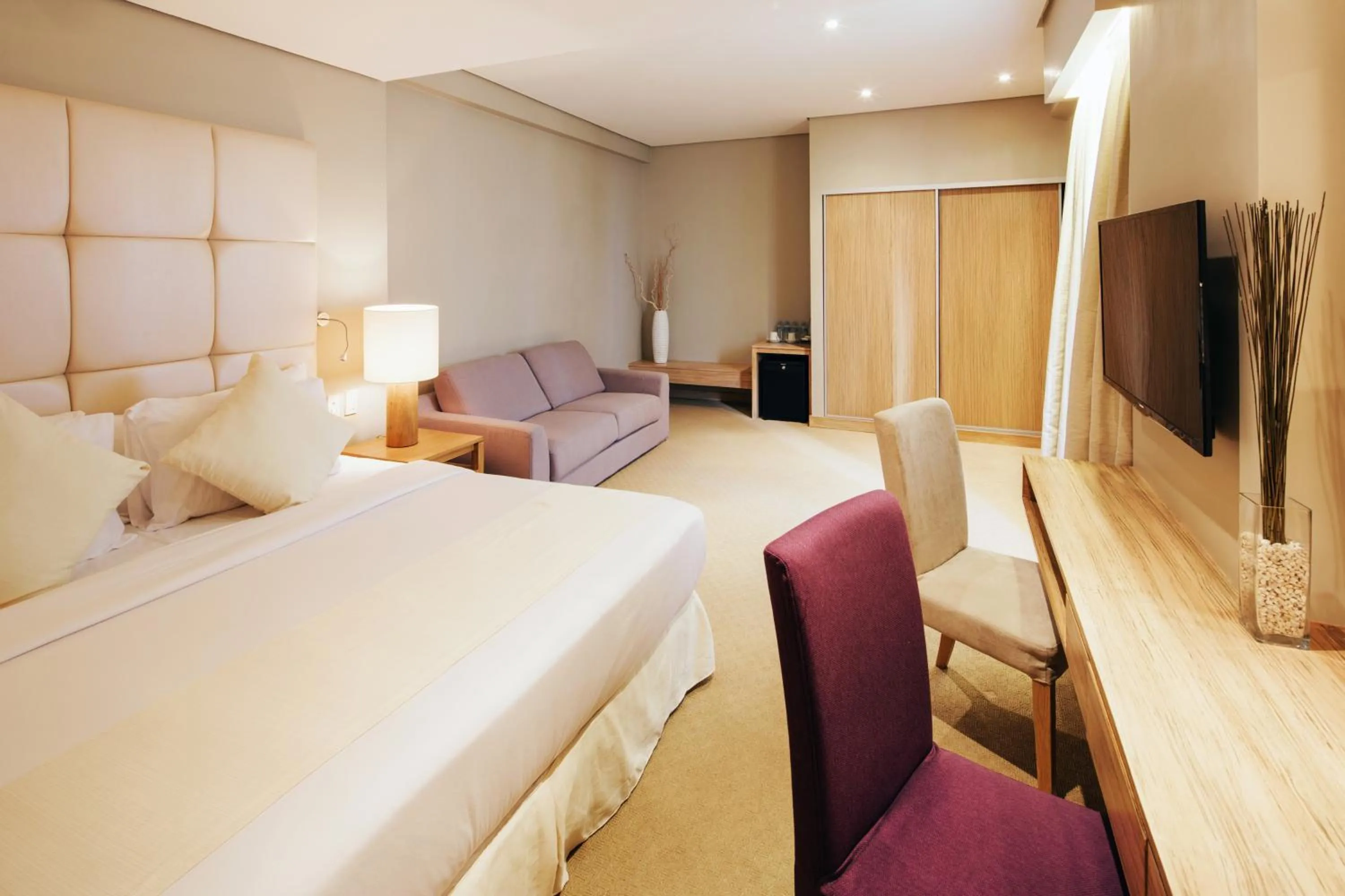 Bed in Villa Caemilla Beach Boutique Hotel