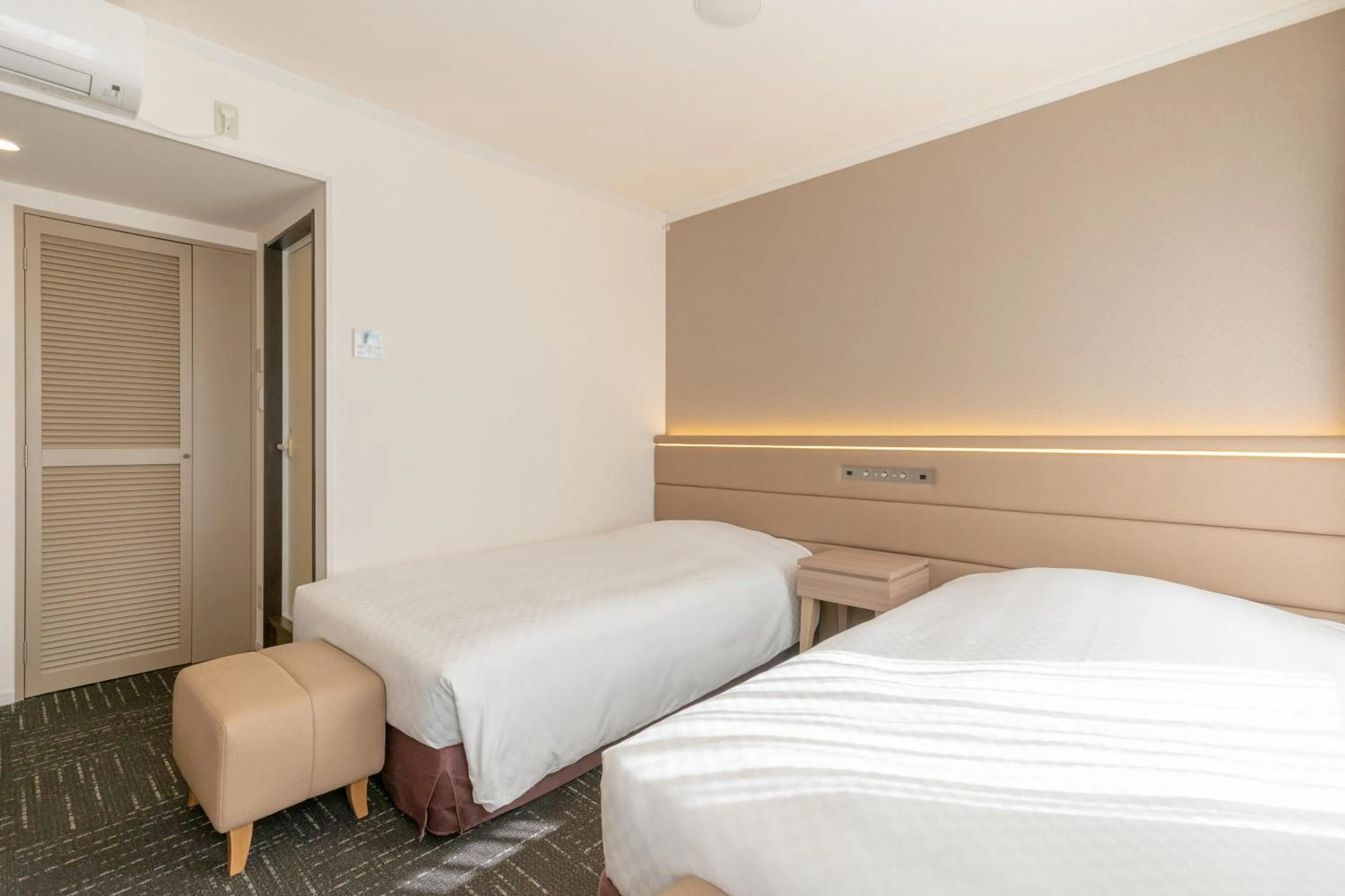 Bed in Libre Garden Hotel