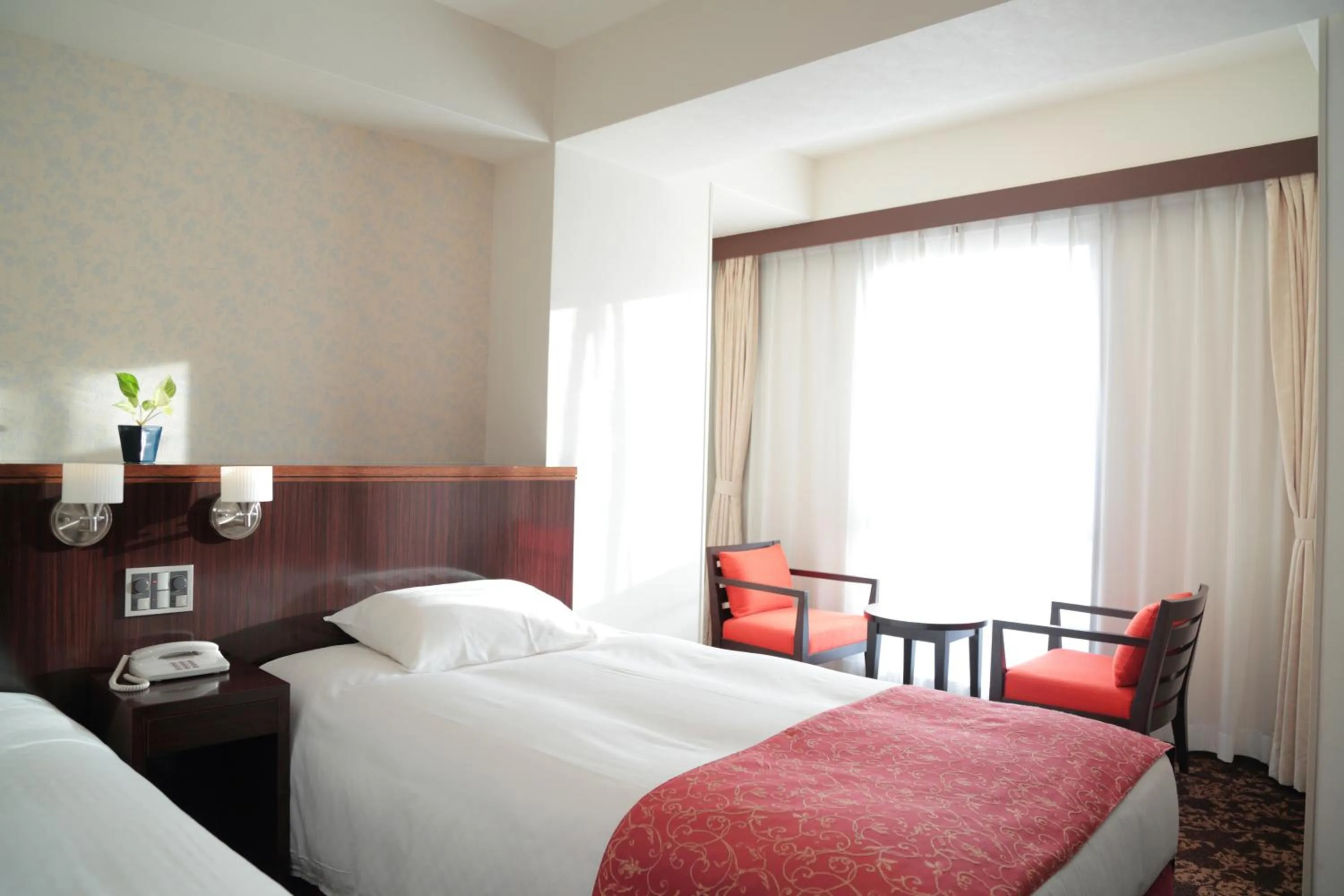 Bed in Libre Garden Hotel