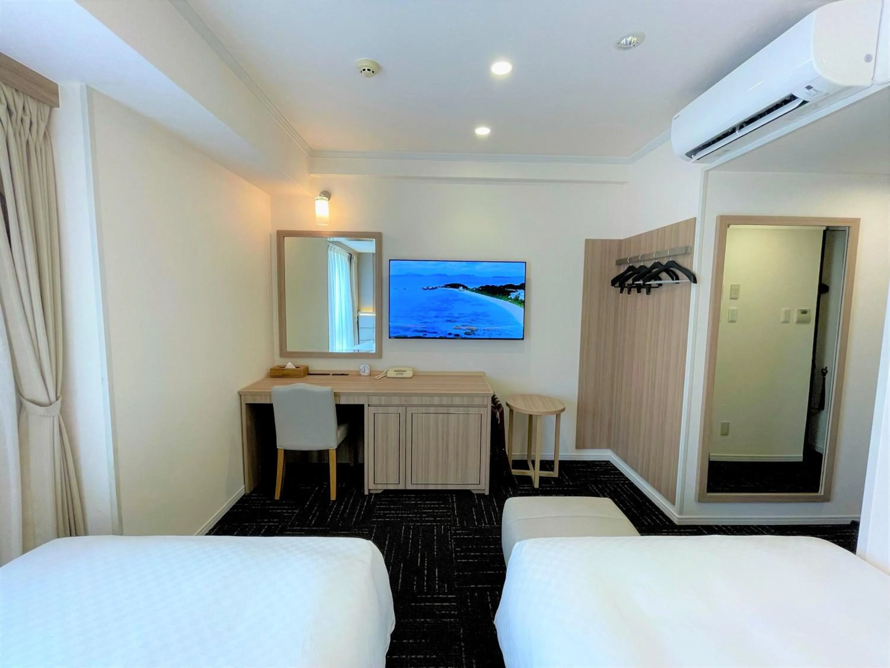 Bed in Libre Garden Hotel