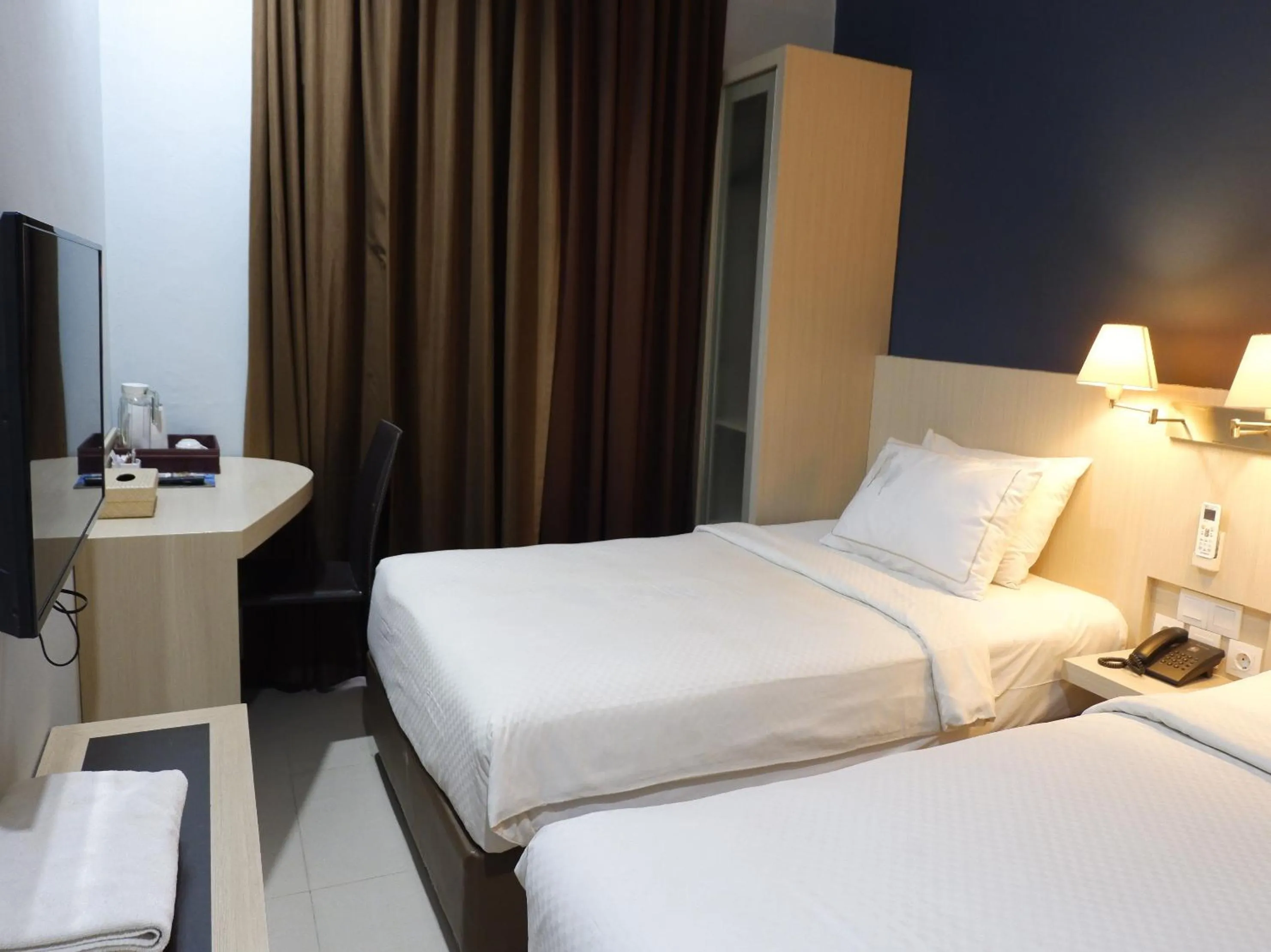 Bed in Rio City Hotel