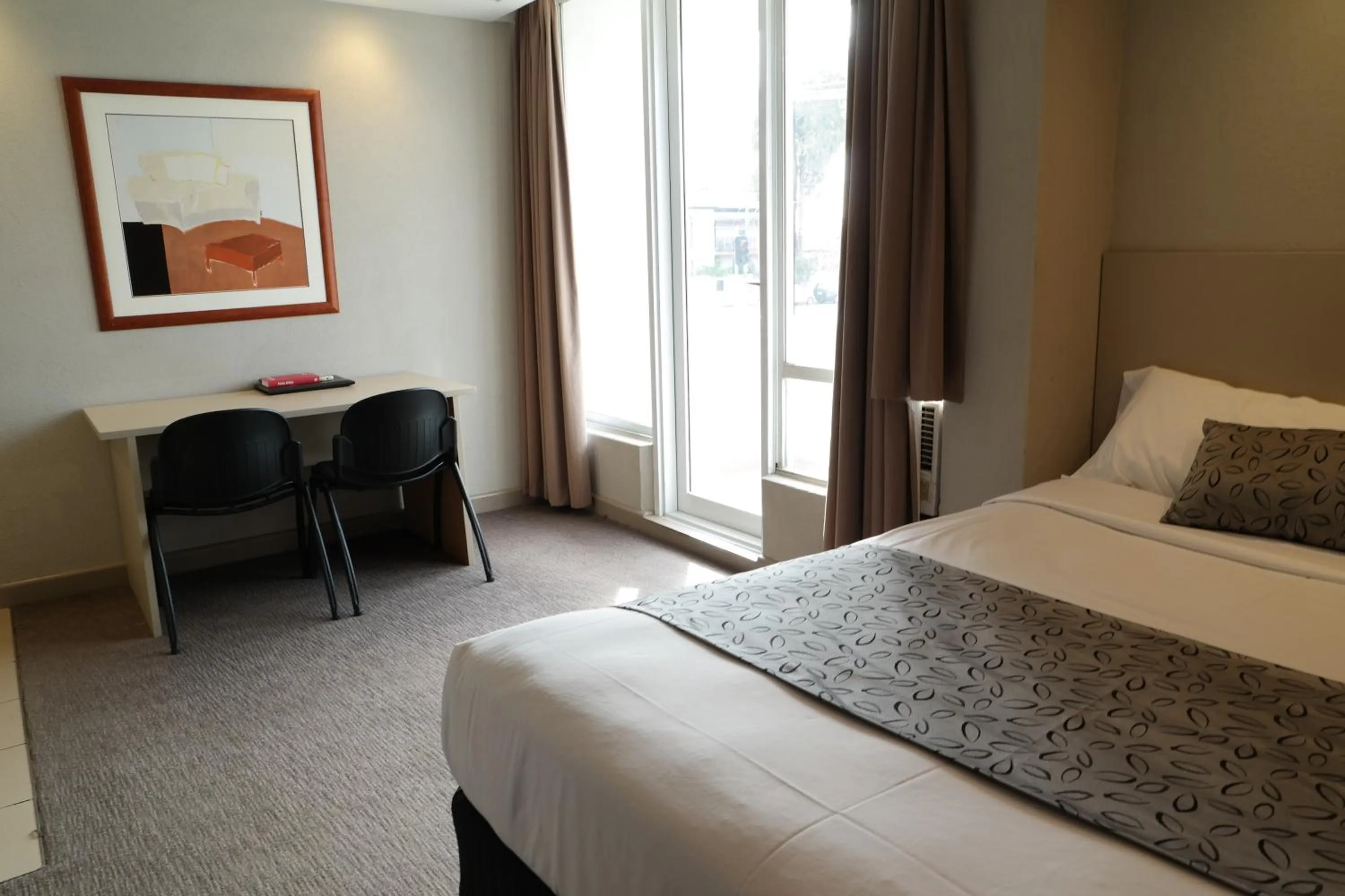 Decorative detail, Bed in Parkville Place Serviced Apartments