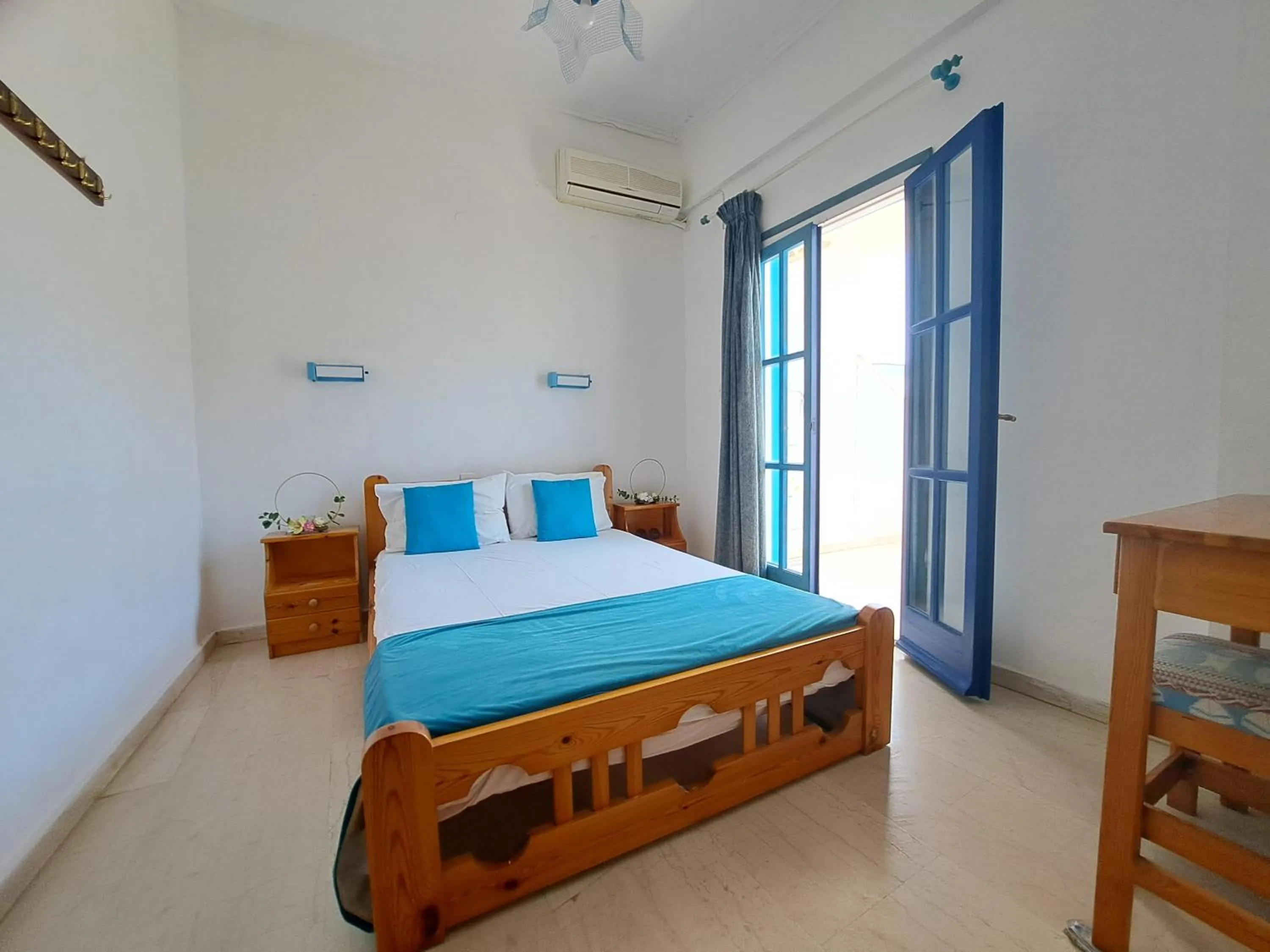 Bed in Apollonia Apartments