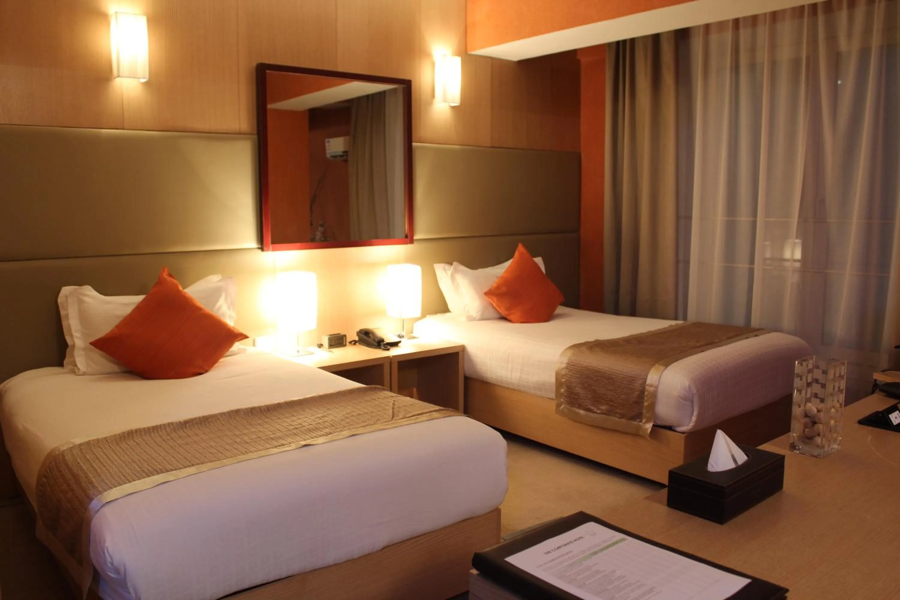 Bed in The Corporate Hotel