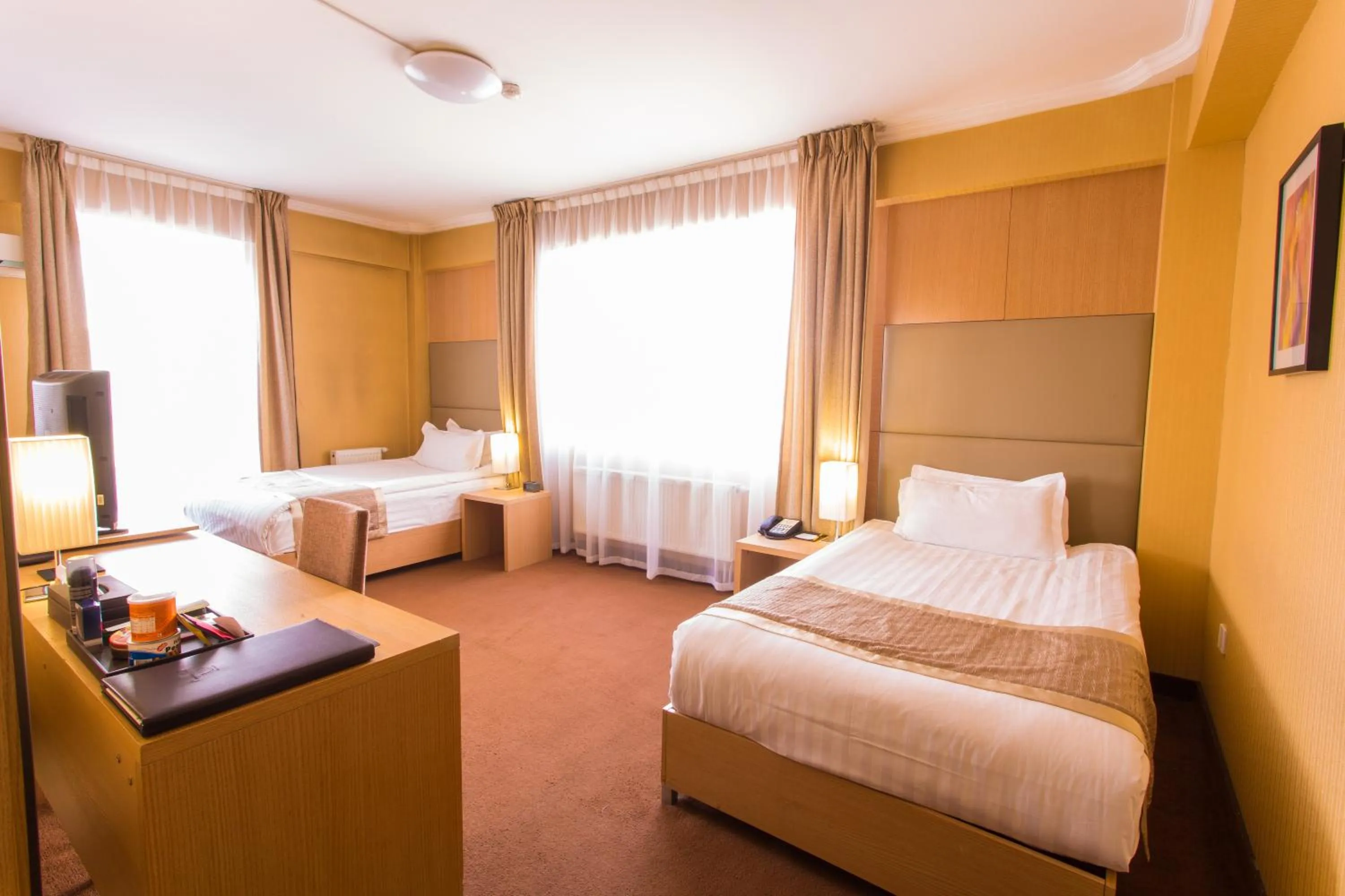 Bed in The Corporate Hotel