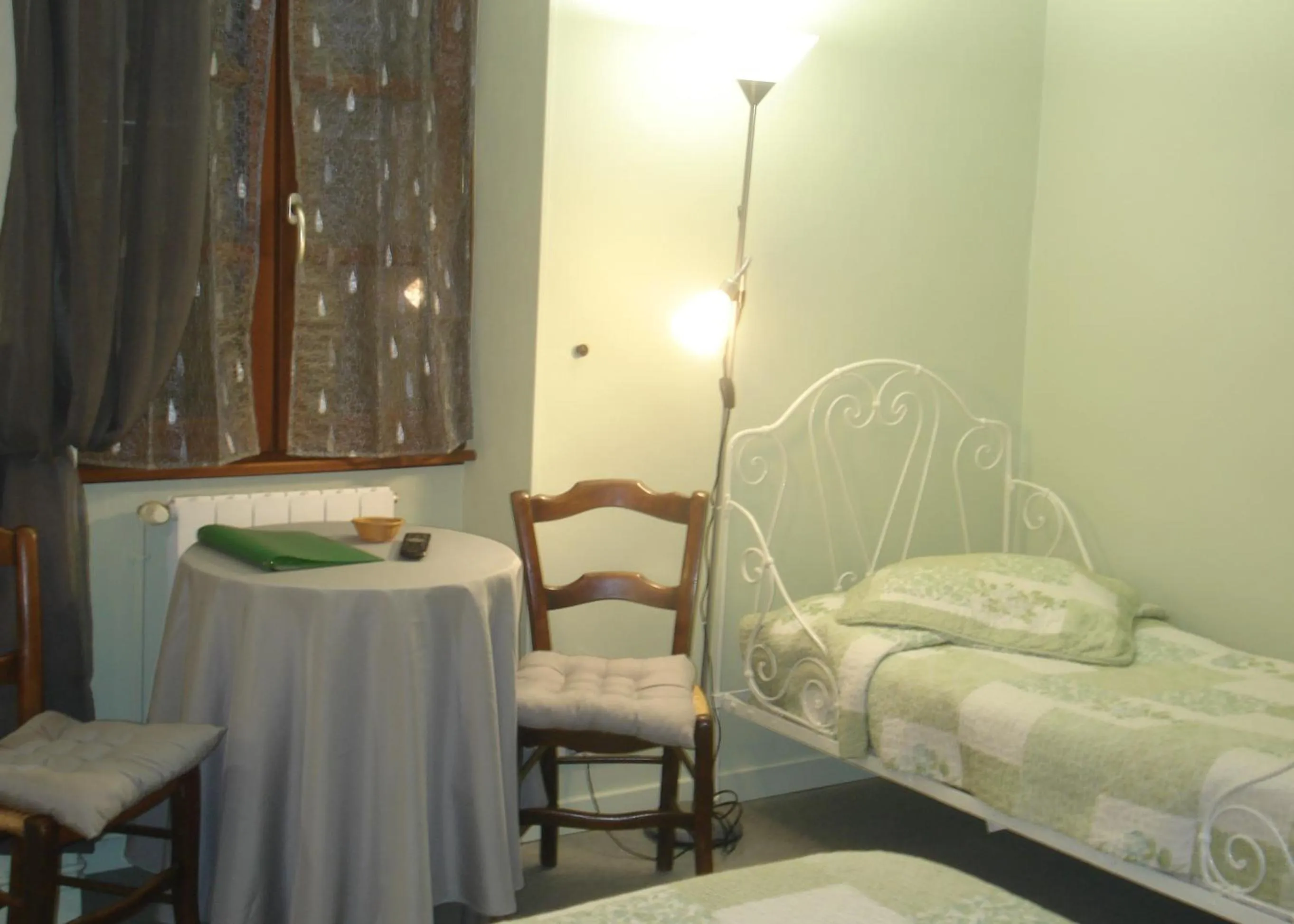 Bed in Auberge Aux Portes de Conques