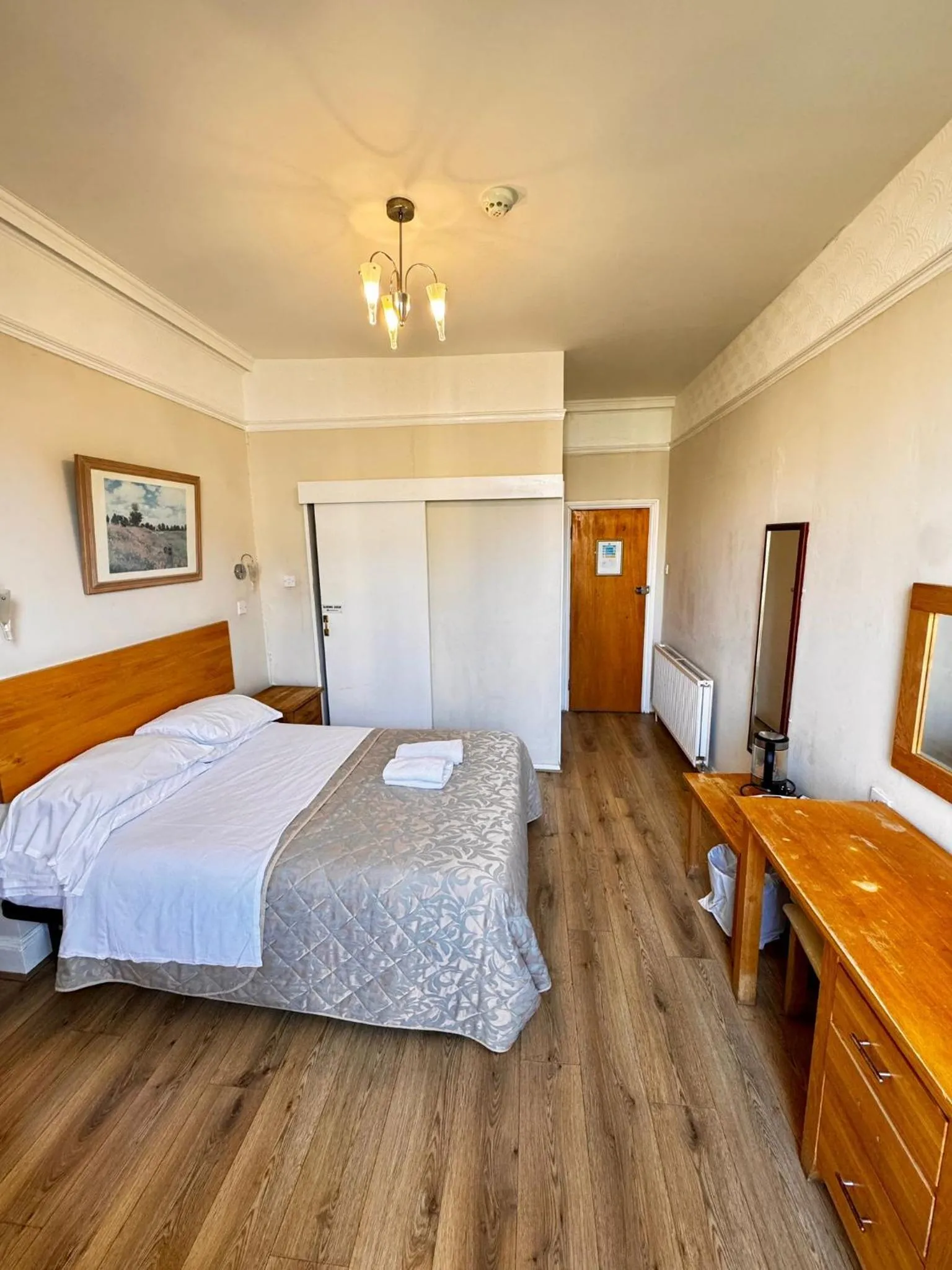 Bed in Ambassador Hotel